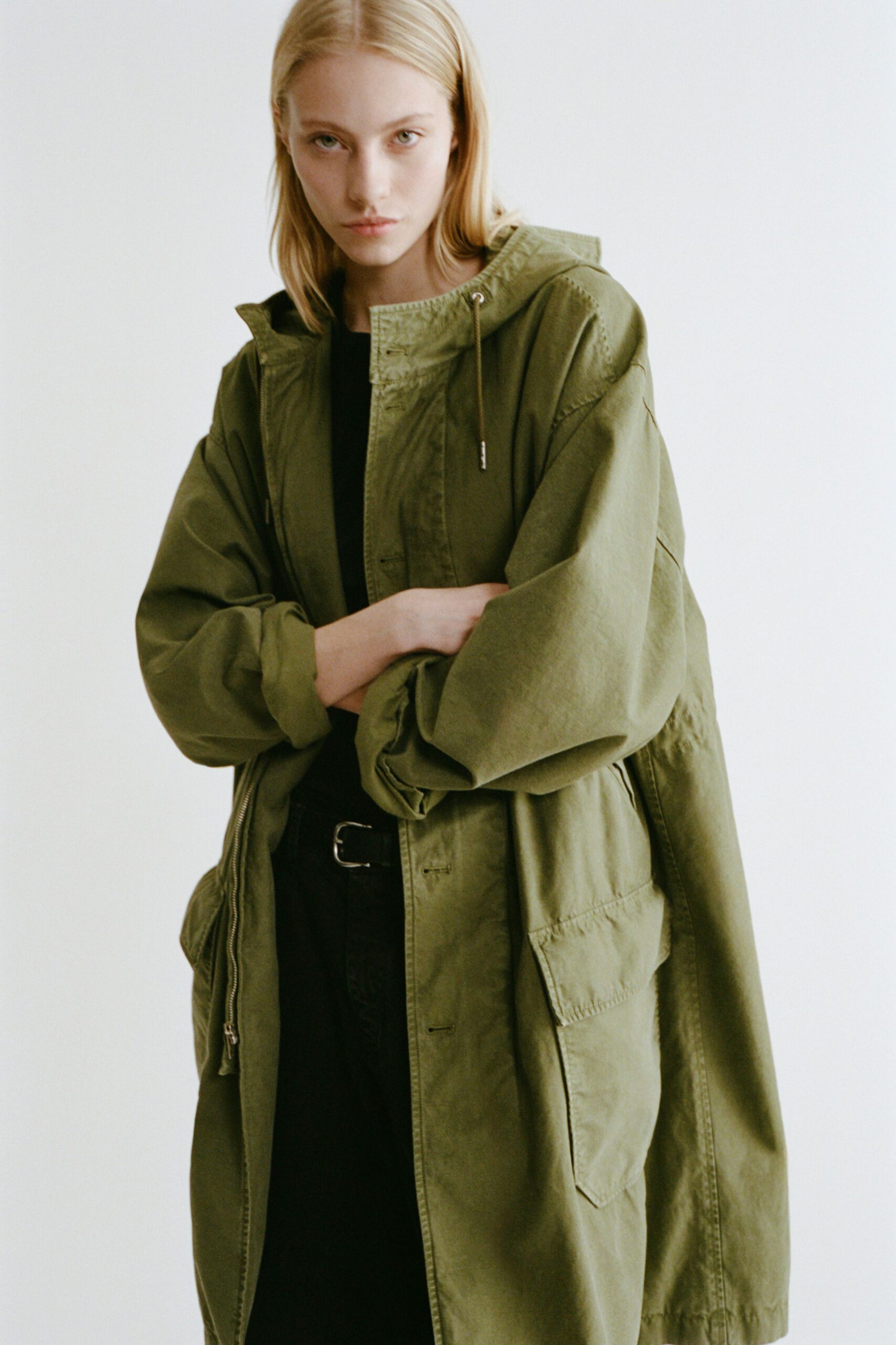 green relaxed jacket with black top