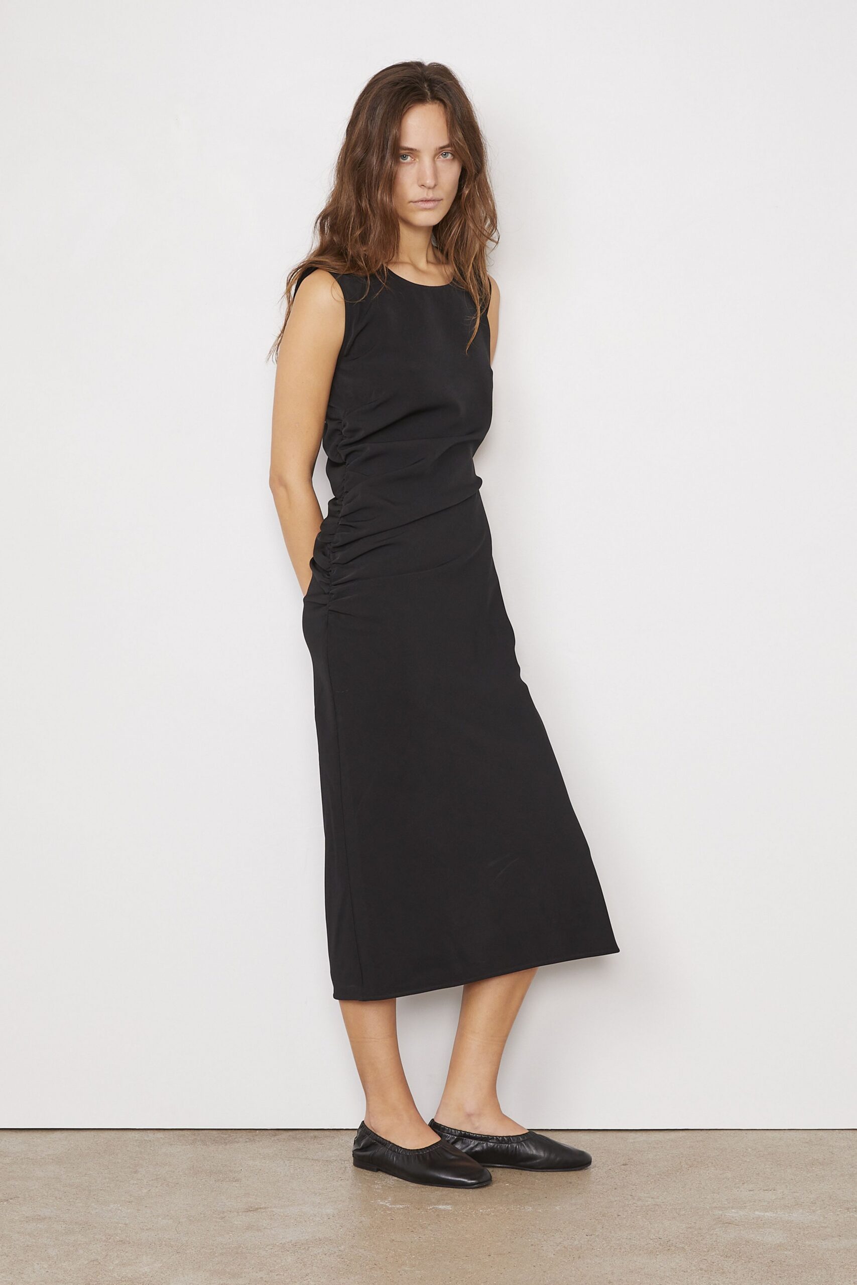 black fitted midi dress with shoes