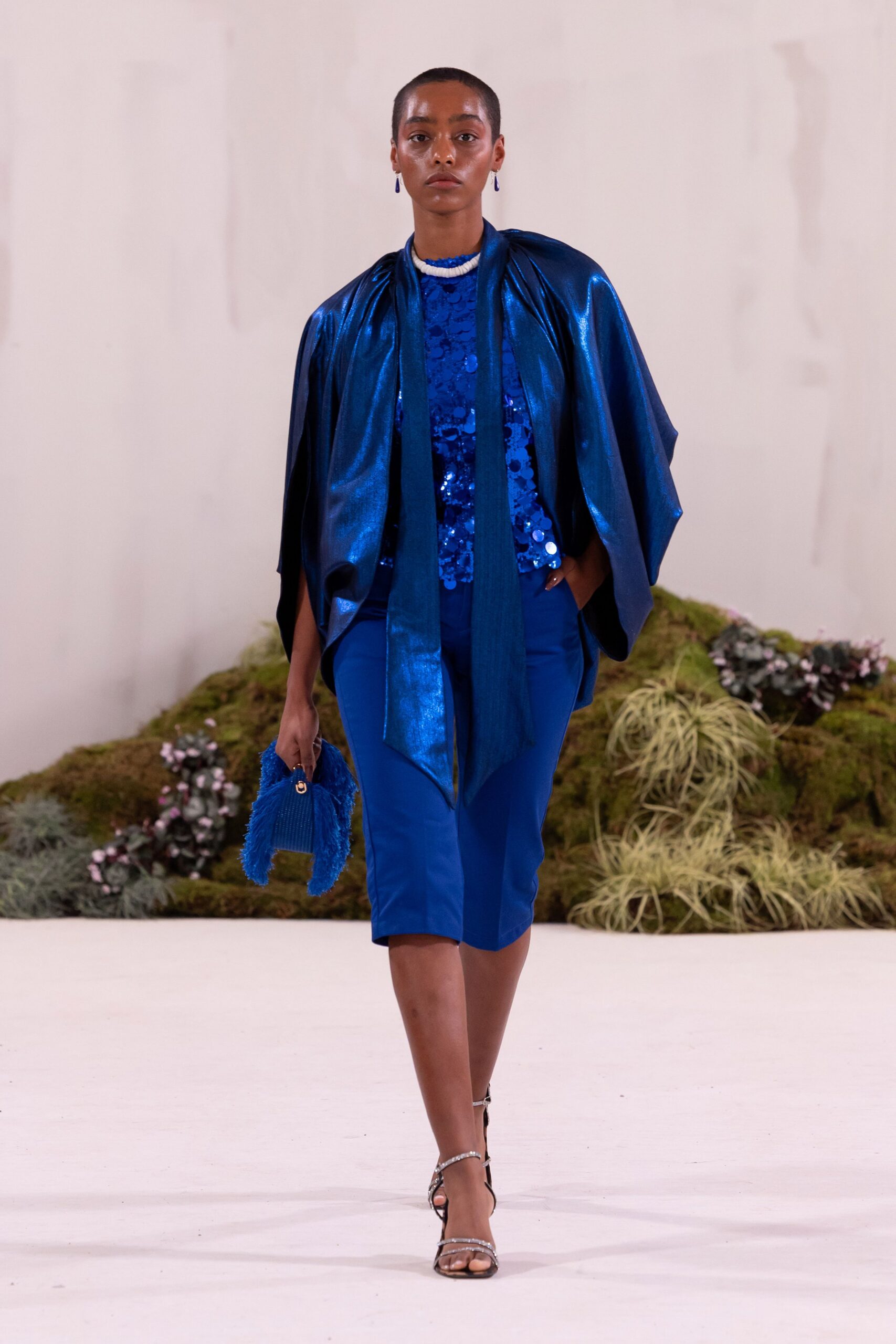 blue sequined top with cape
