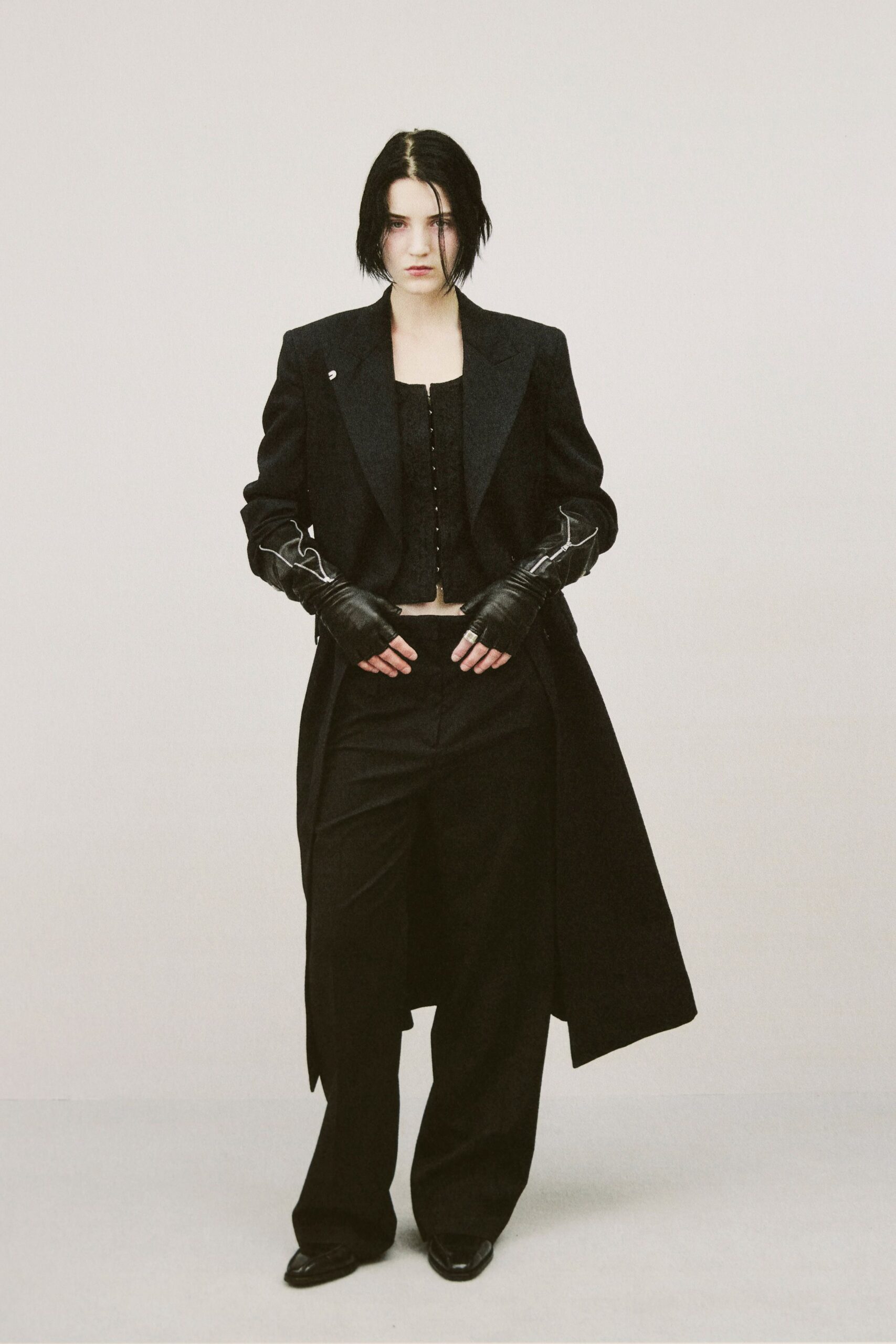 black coat and fitted top