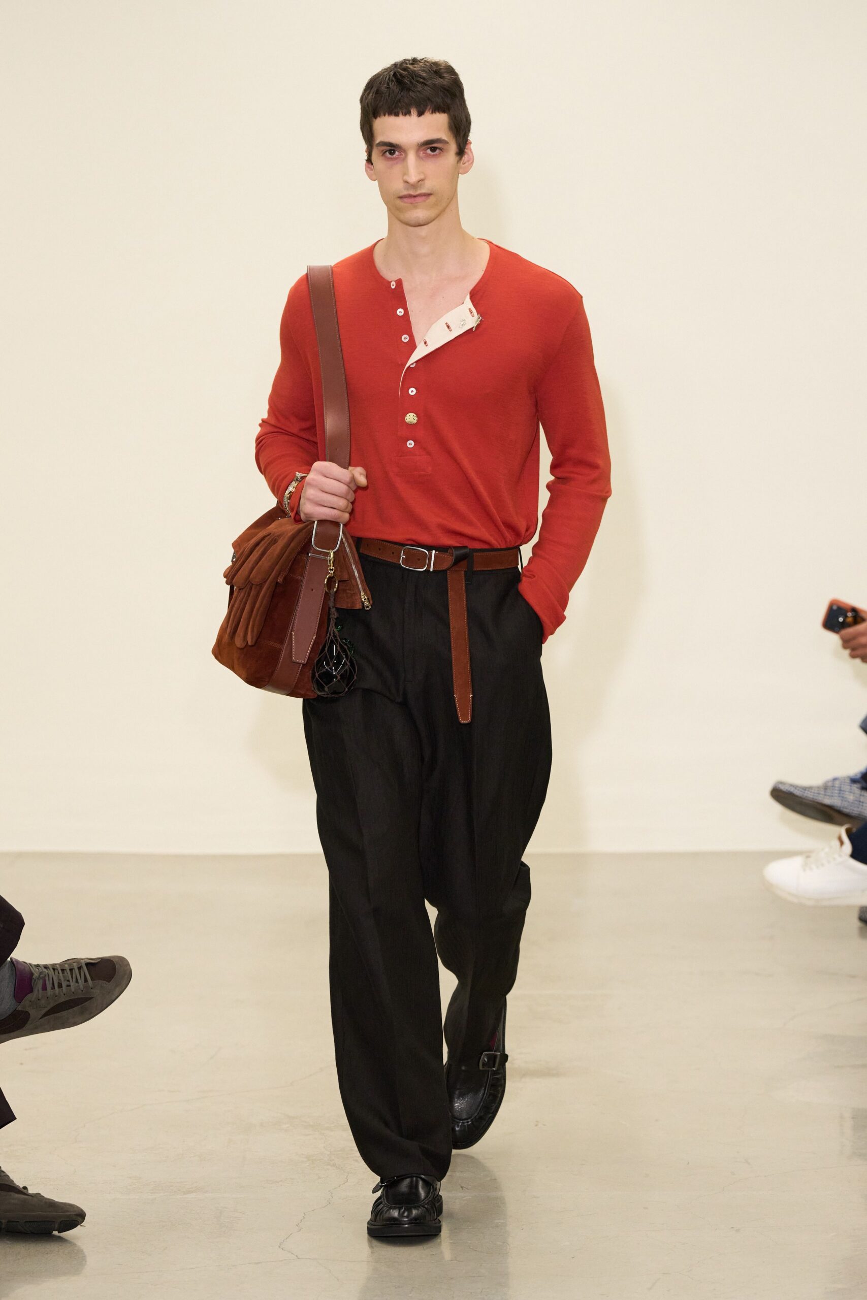 red fitted shirt with black pants