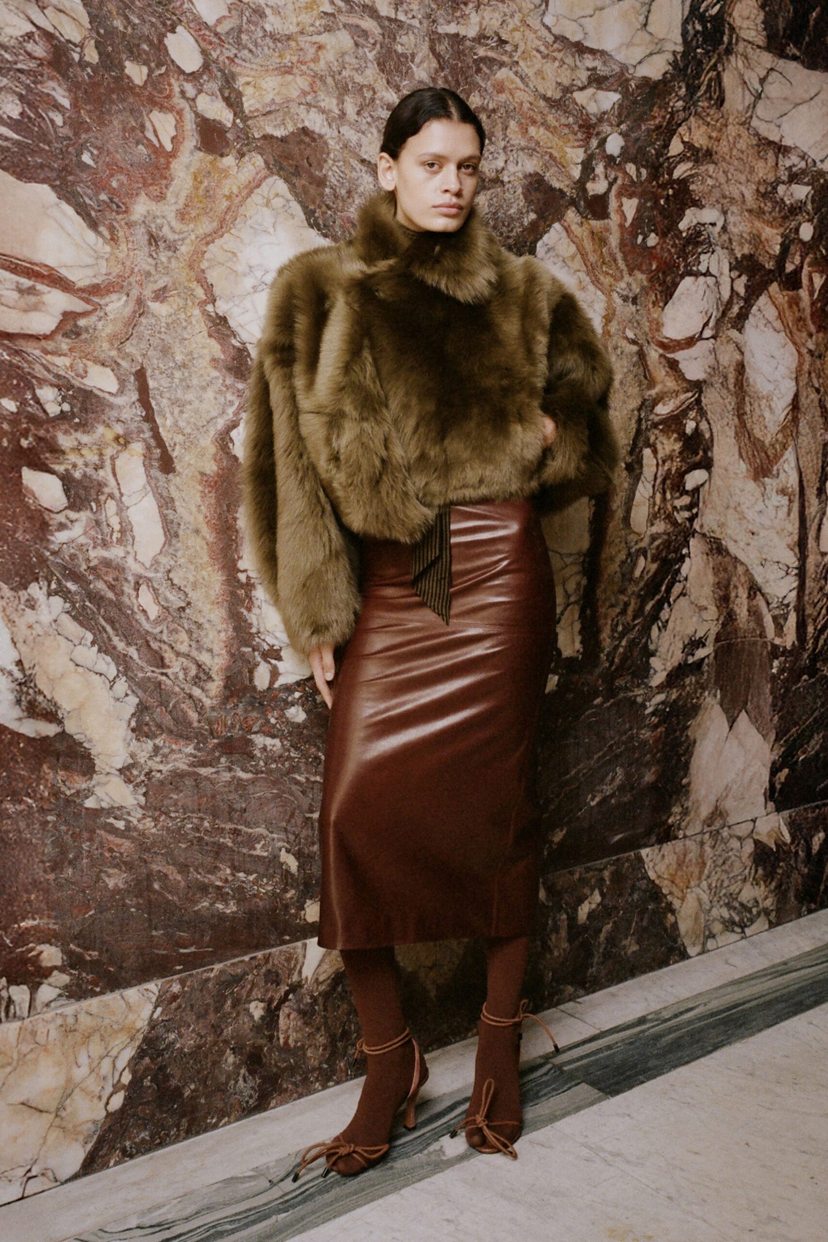 brown faux-fur coat and leather skirt