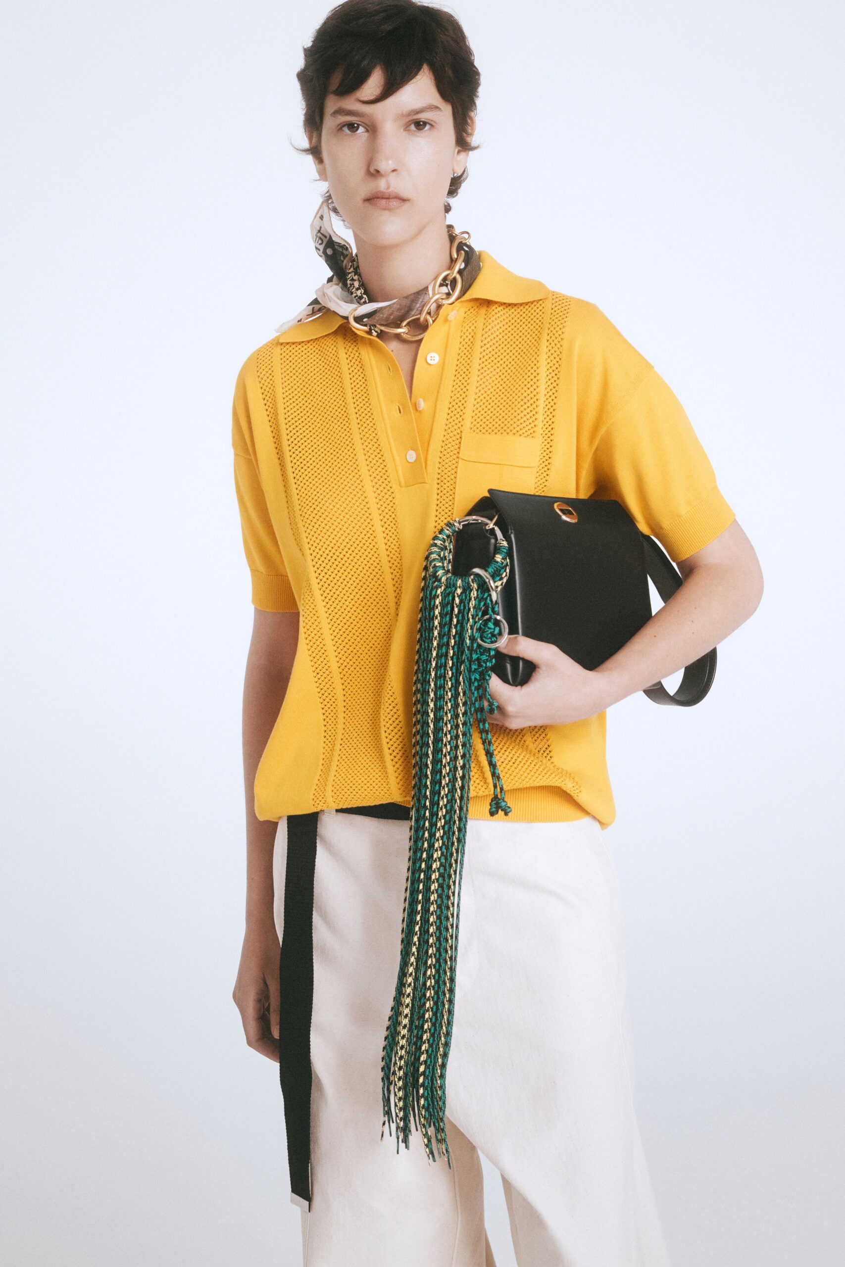 yellow cotton short-sleeve collared fitted pleated top