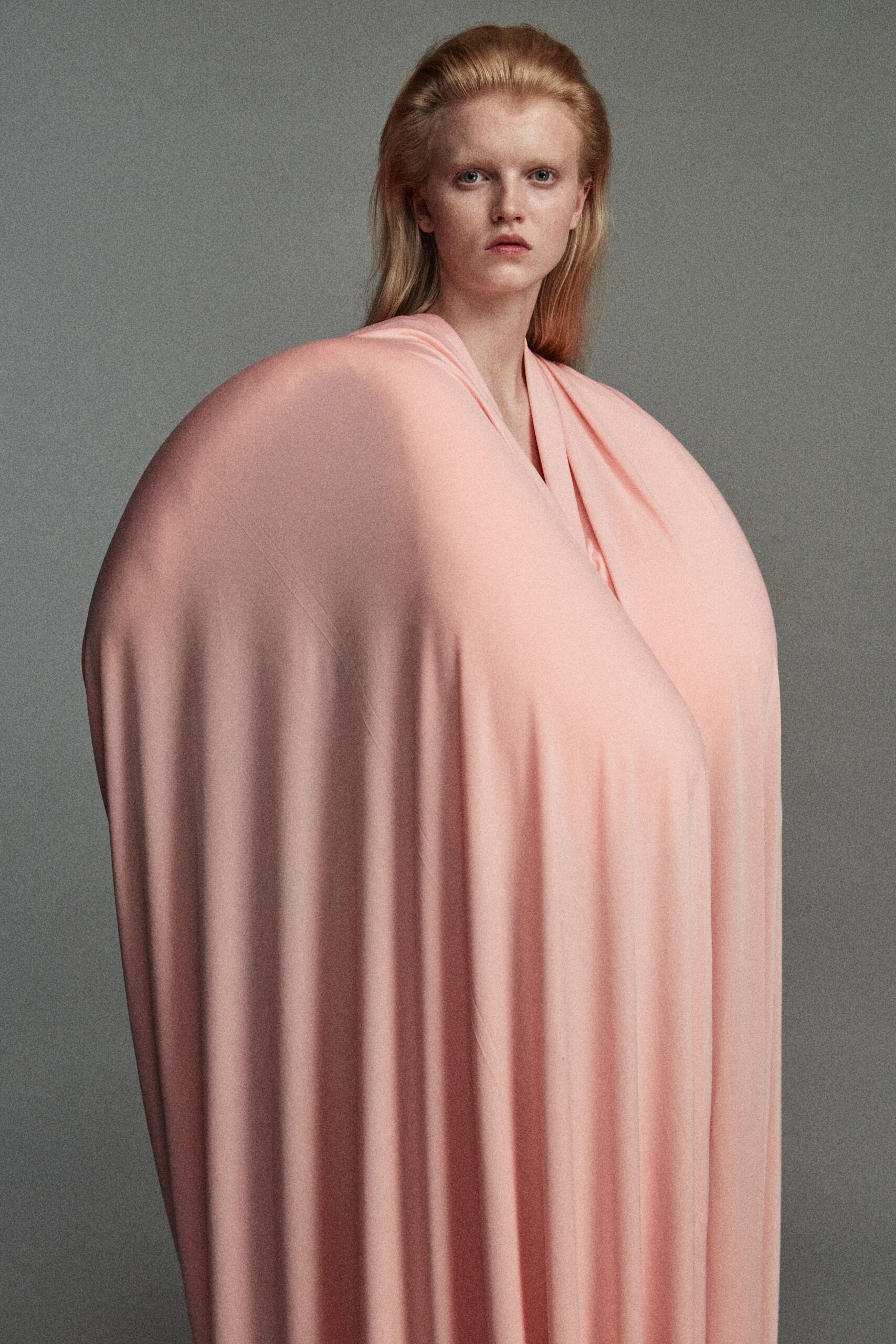 pink draped sleeveless dress