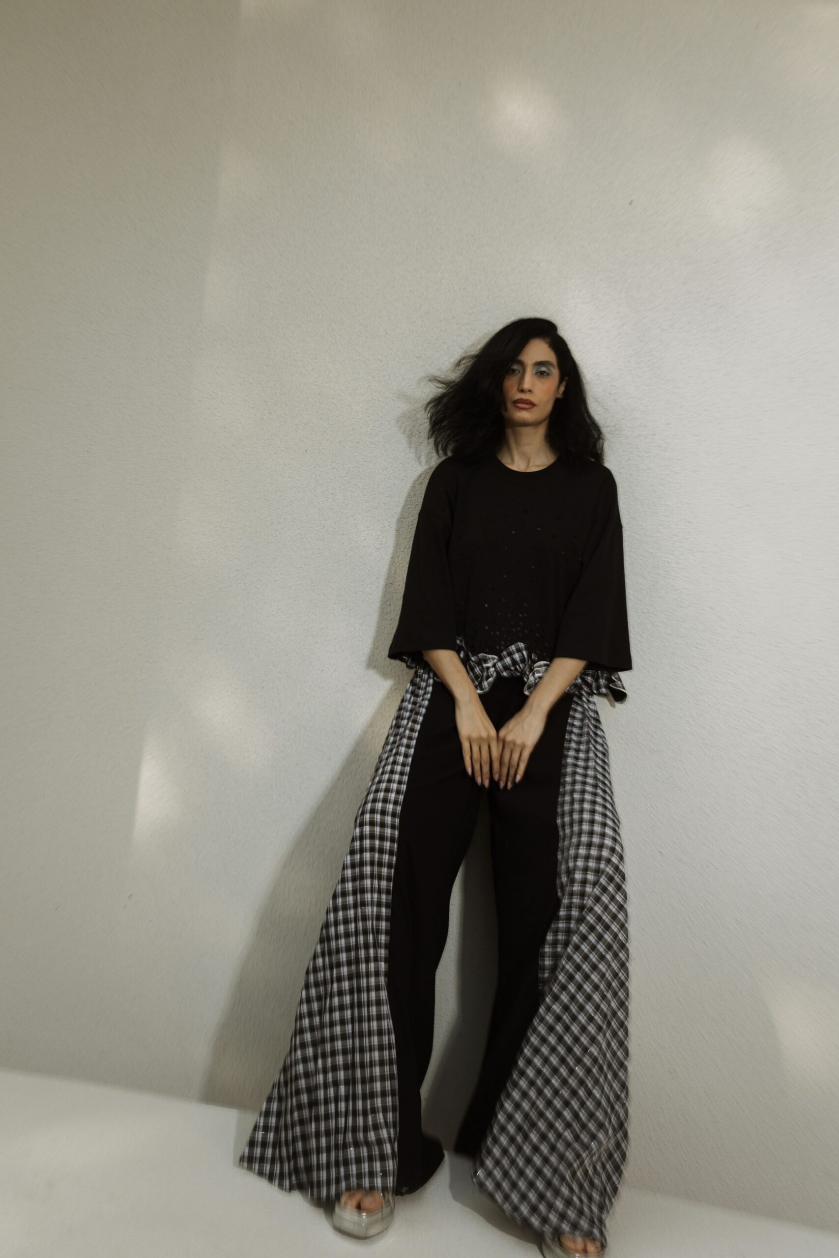 black relaxed top with wide-leg pants