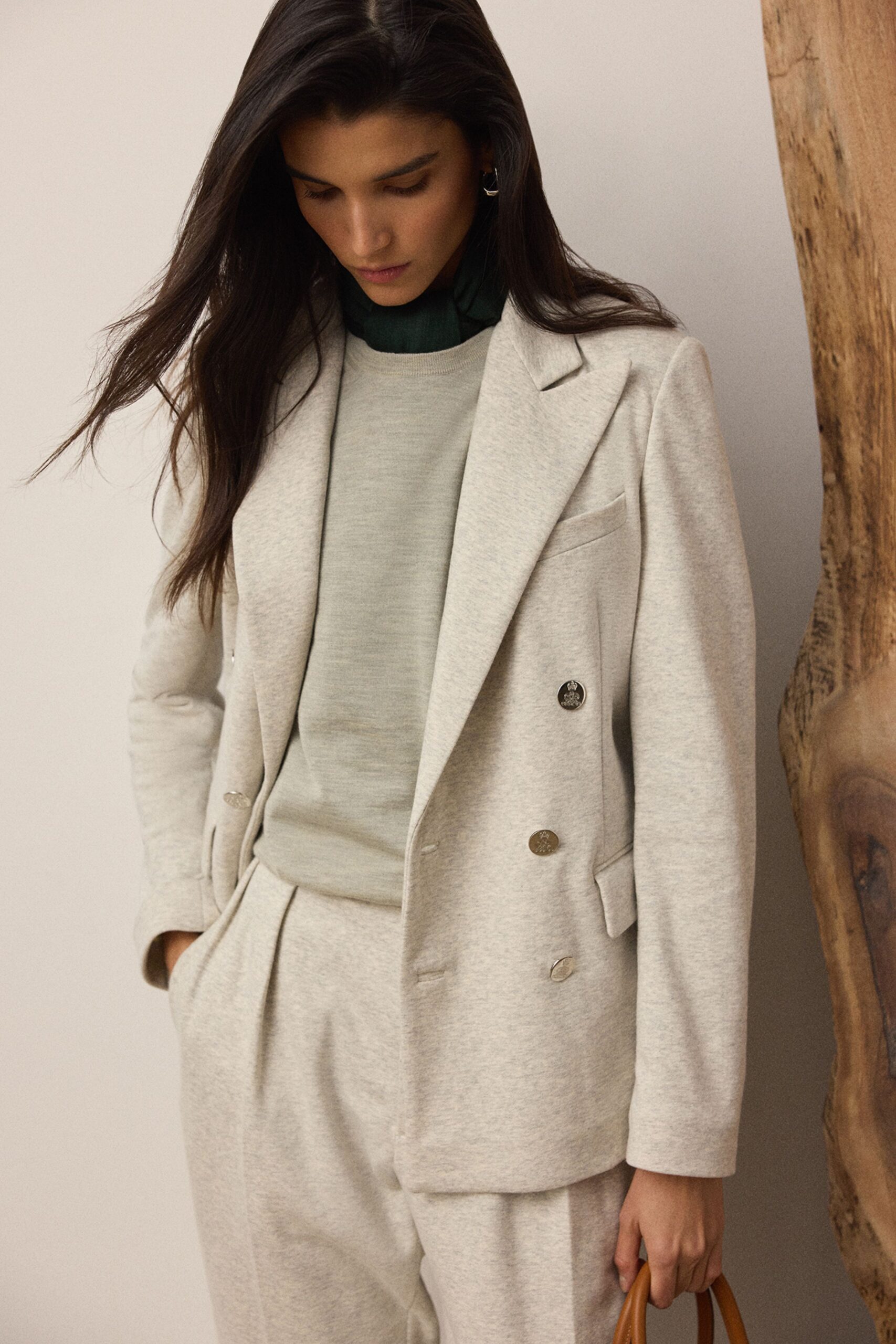beige tailored blazer with green top