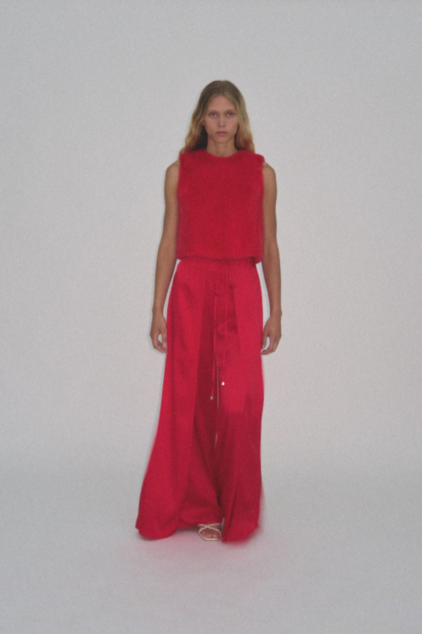 red fur sleeveless fitted top