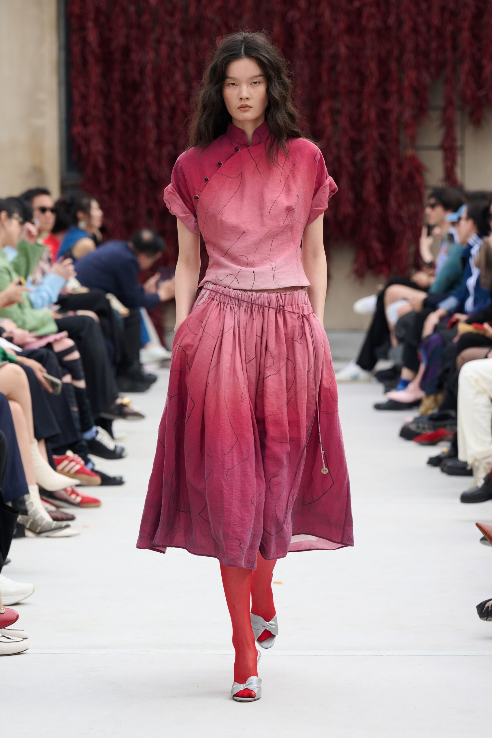 pink silk top and midi skirt