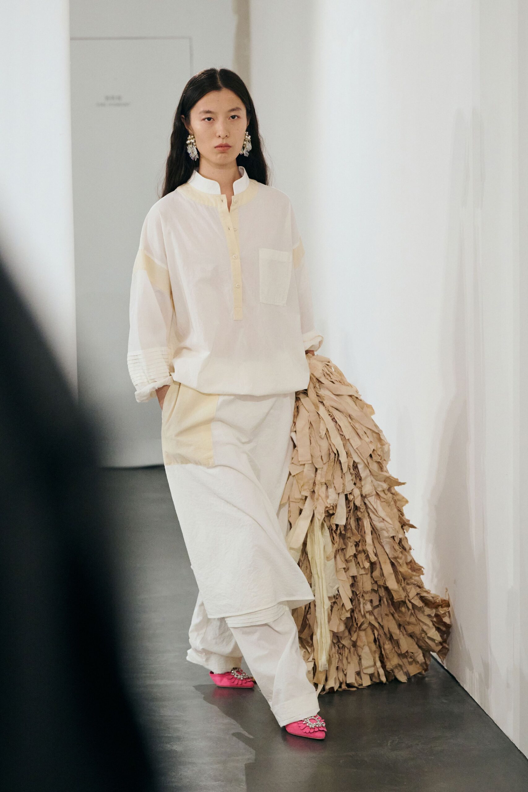 white relaxed shirt and pants