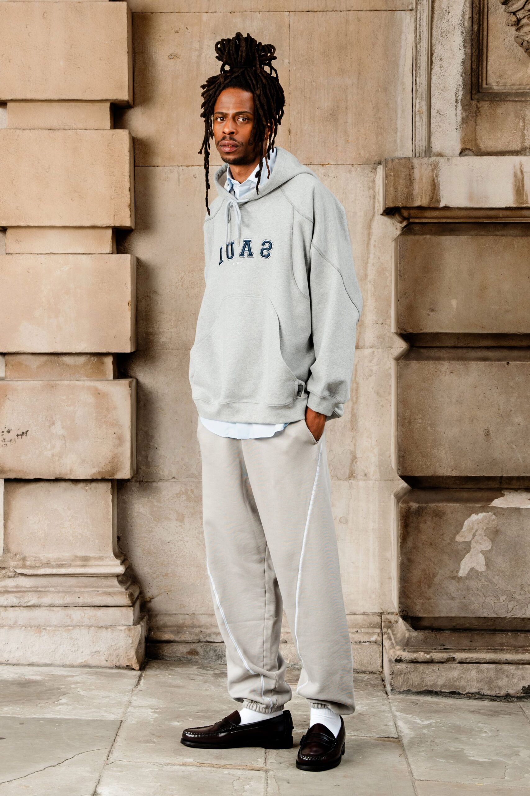 gray oversized hoodie with beige pants