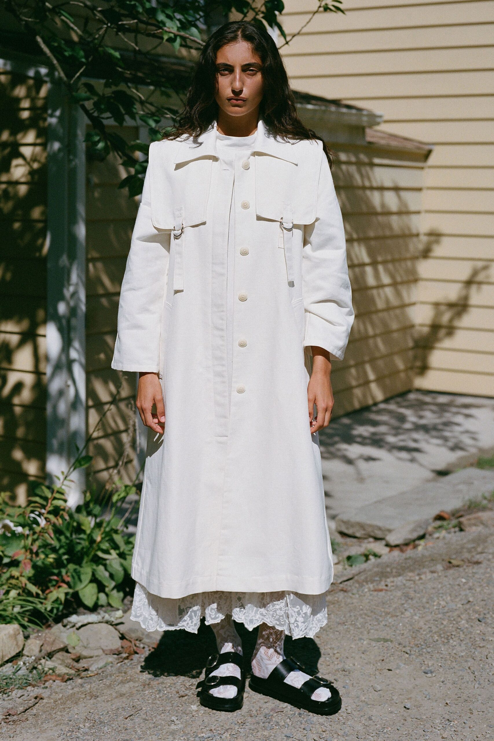 white cotton long-sleeve collared relaxed buttoned pockets coat
