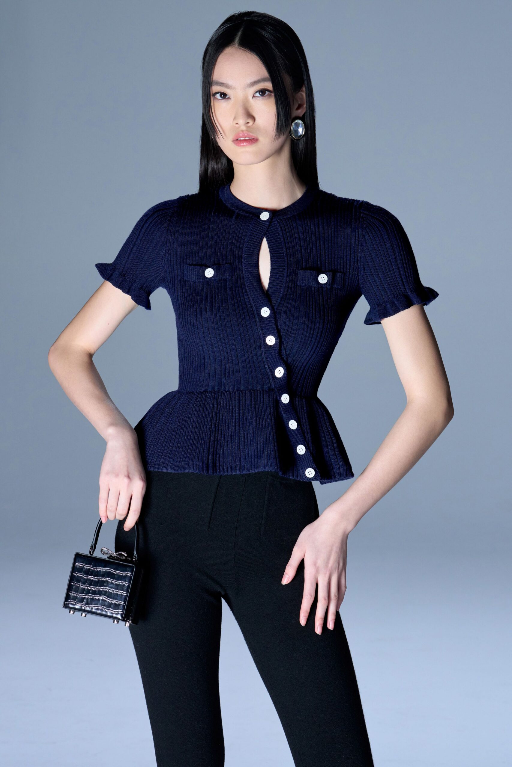 blue knit short-sleeve collared fitted buttoned flared top