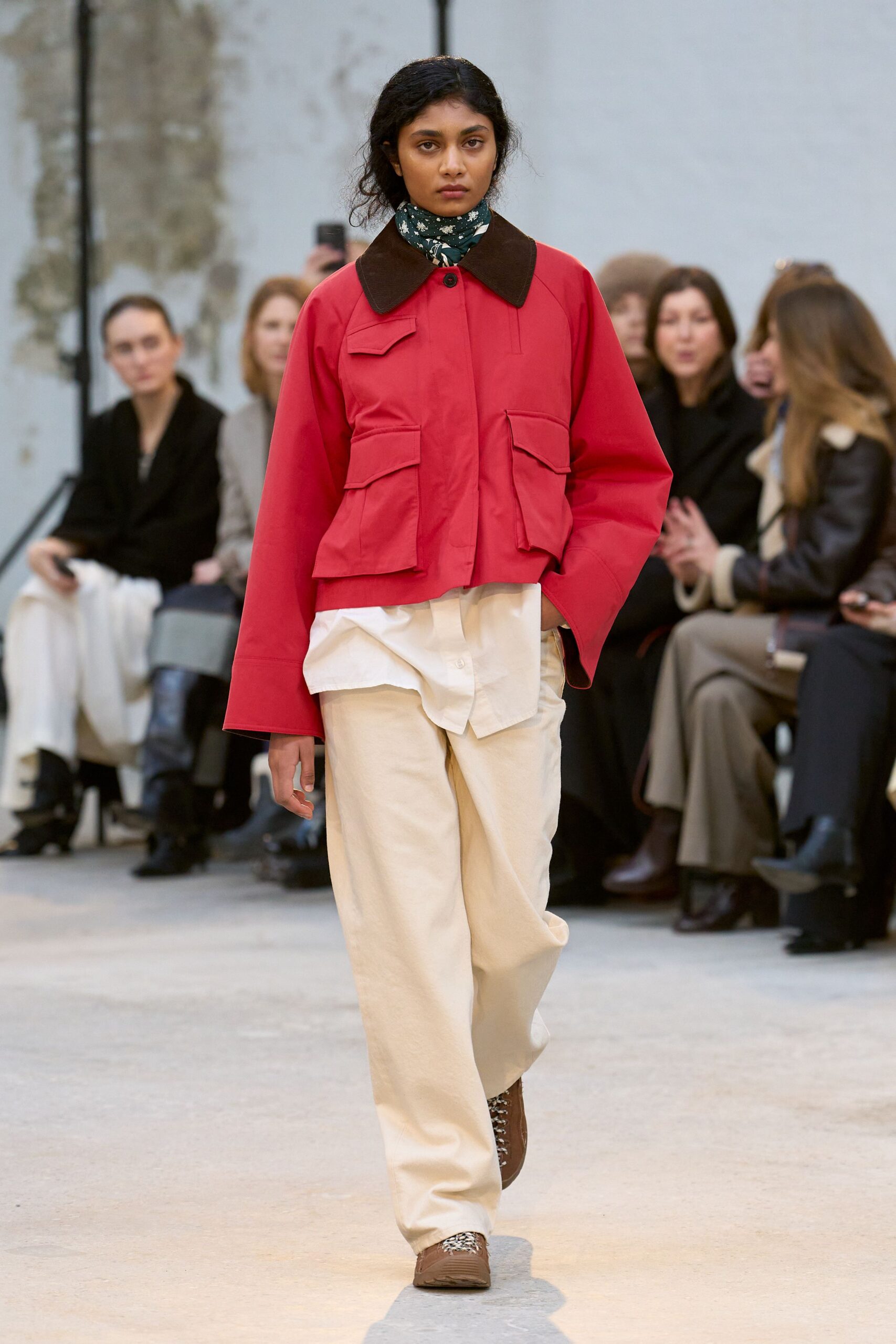 red oversized jacket with beige pants