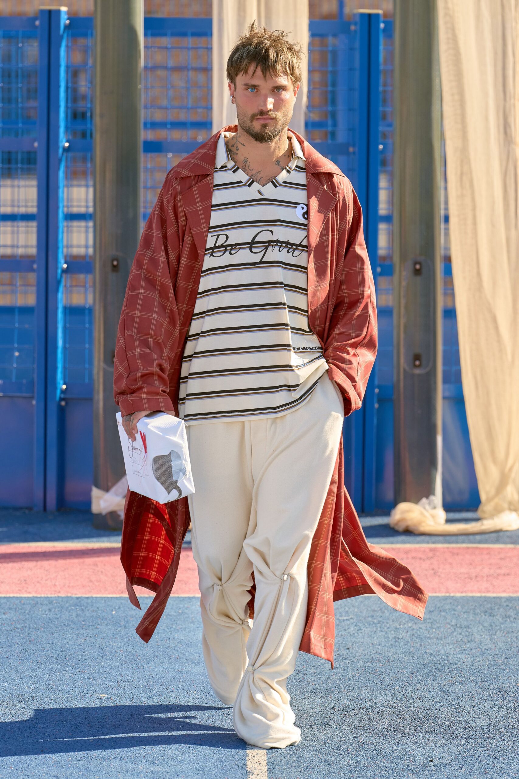 red checked coat with t-shirt and pants
