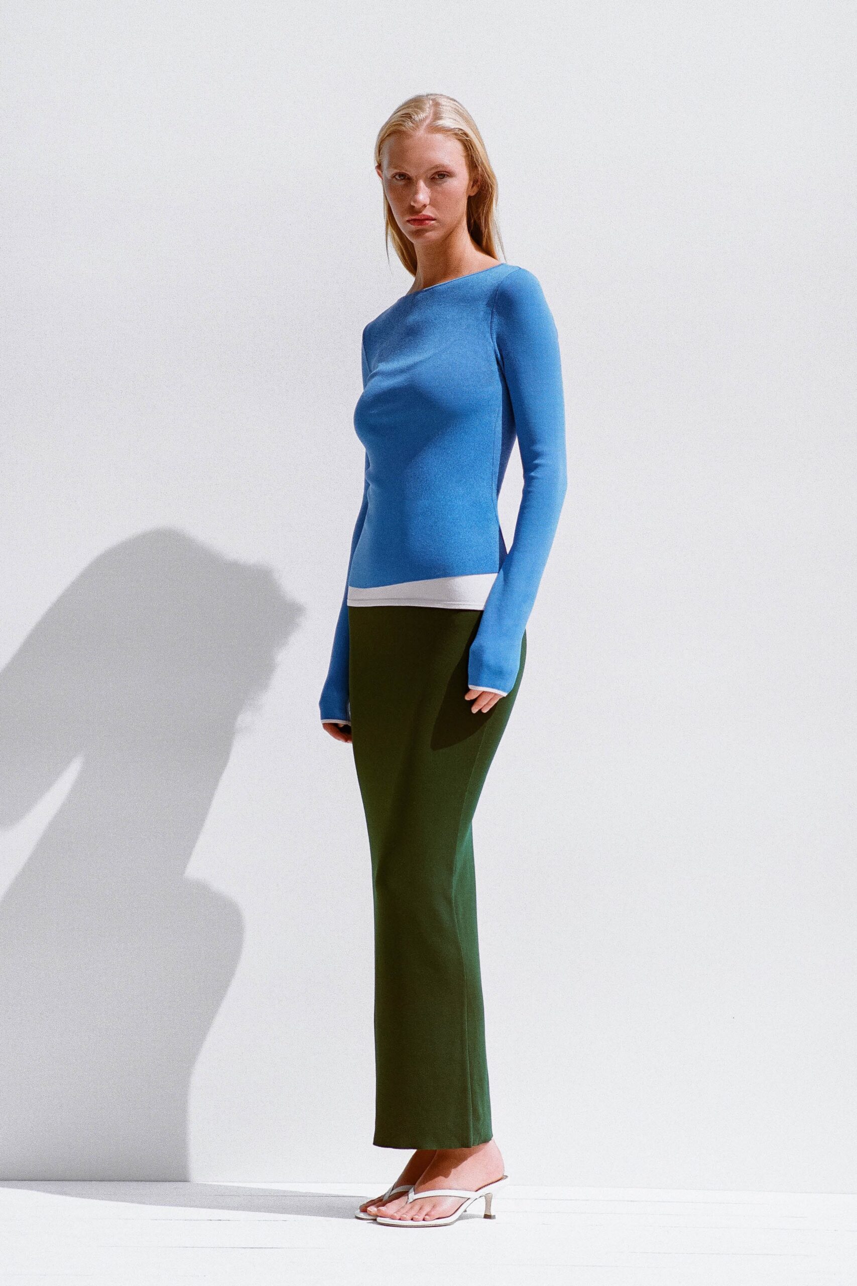 blue cotton long-sleeve scoop-neck fitted top