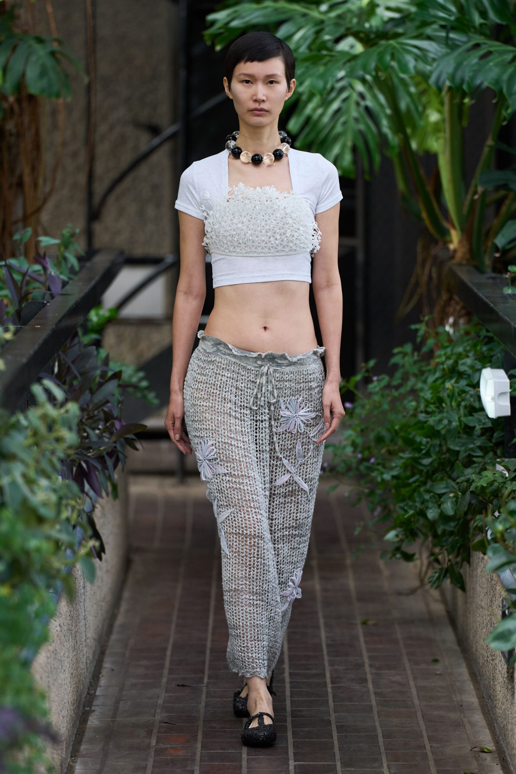 white crop-top gray wide-leg pants