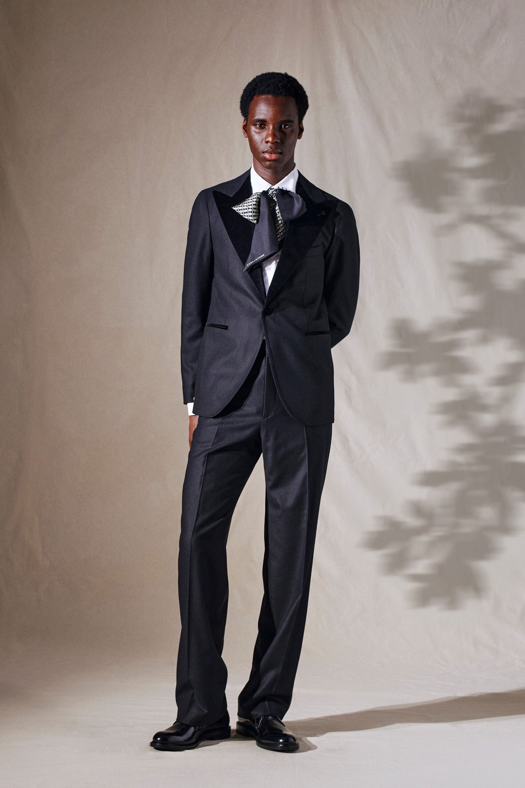 black tailored suit with white shirt