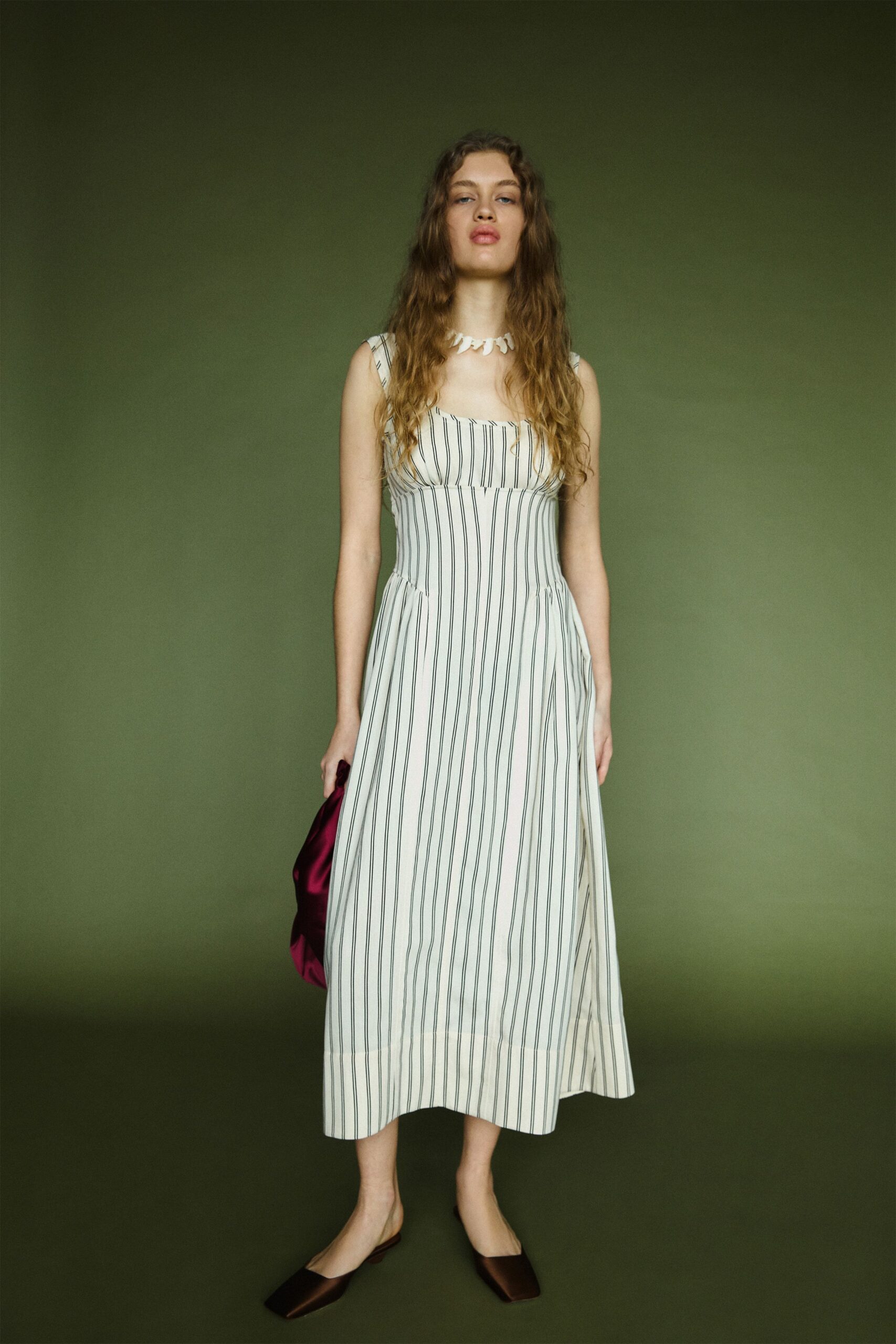 striped midi dress with bag