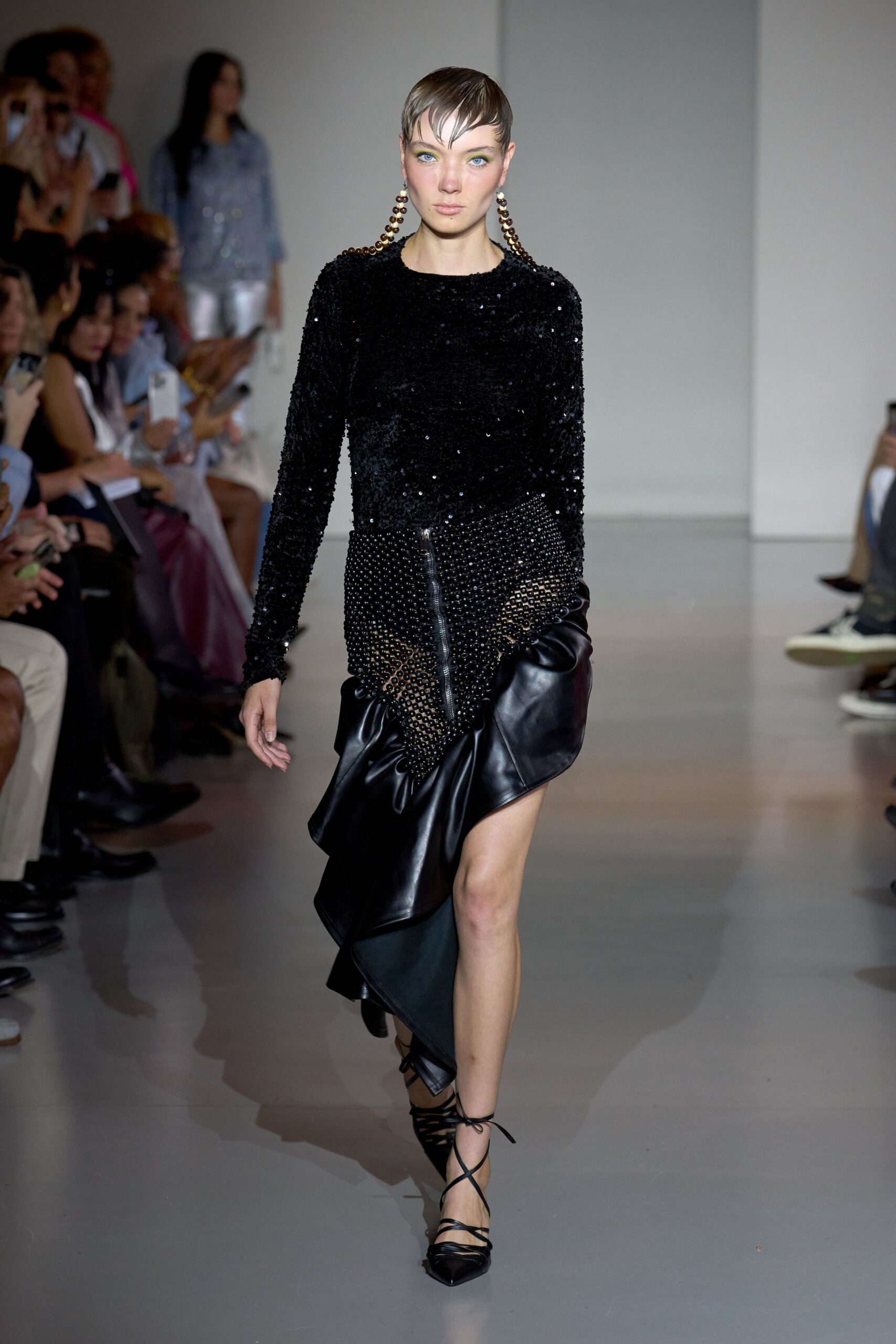black sequin top and leather skirt