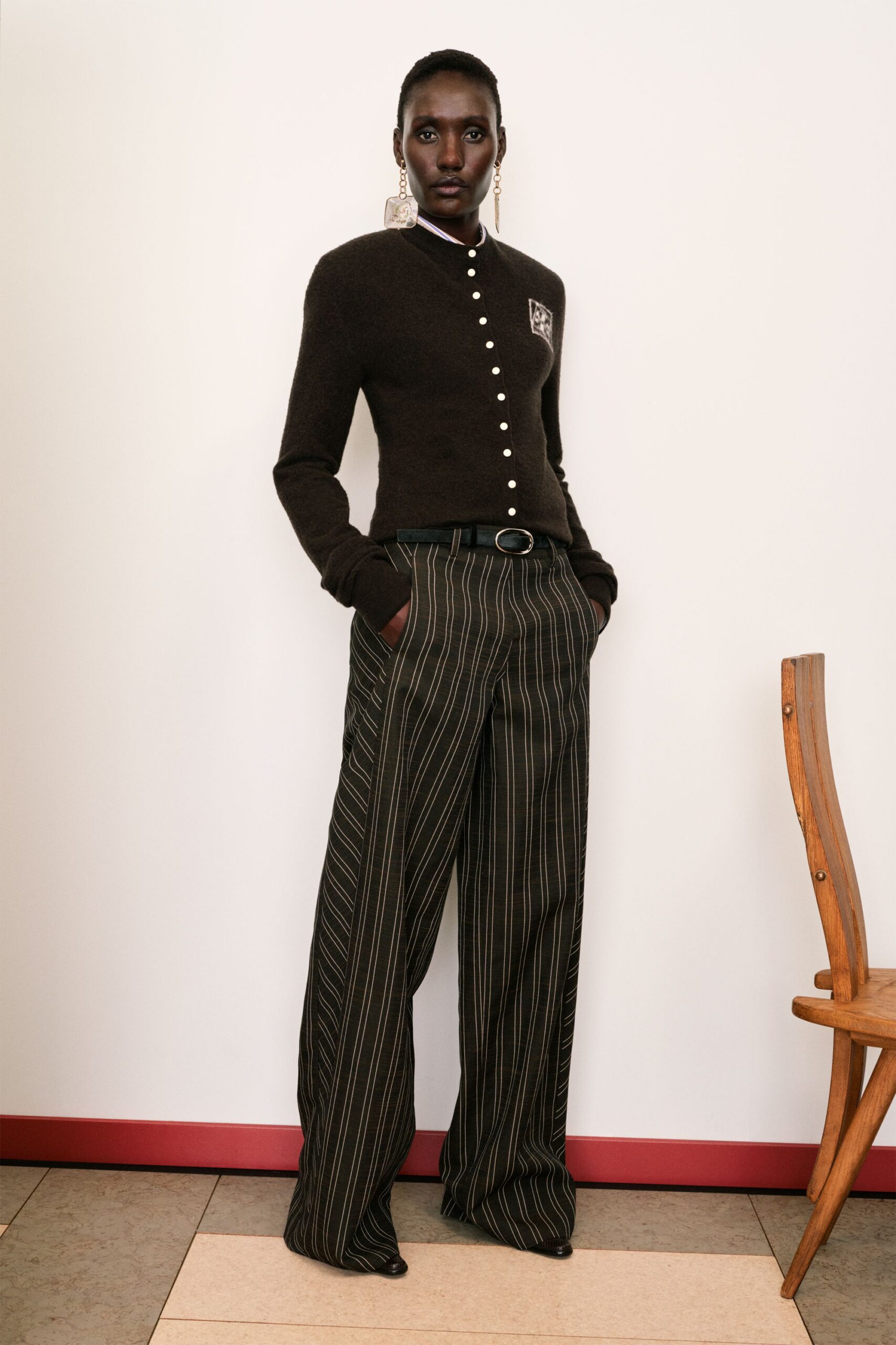 brown wool cardigan with black pants