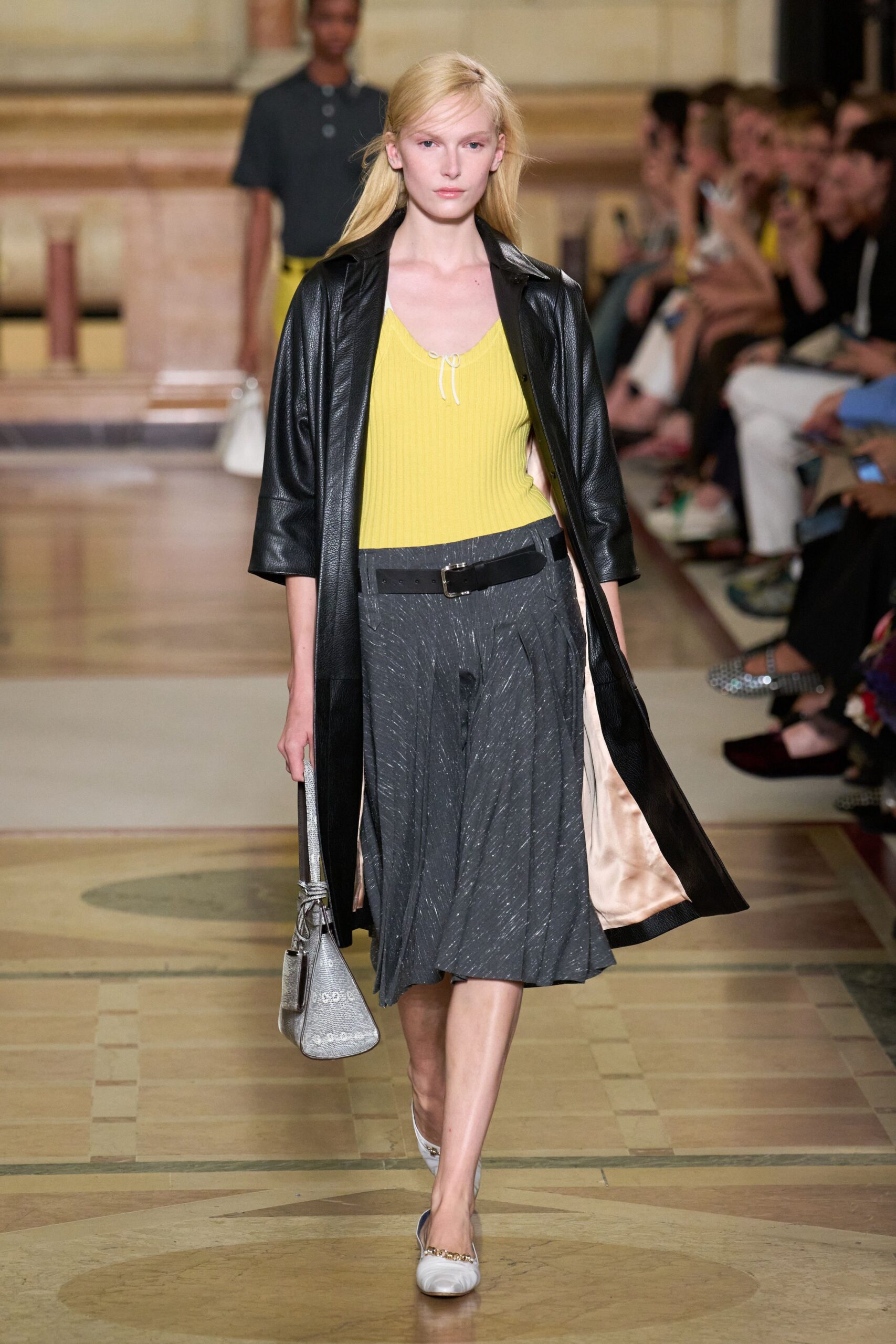 black leather coat with yellow top