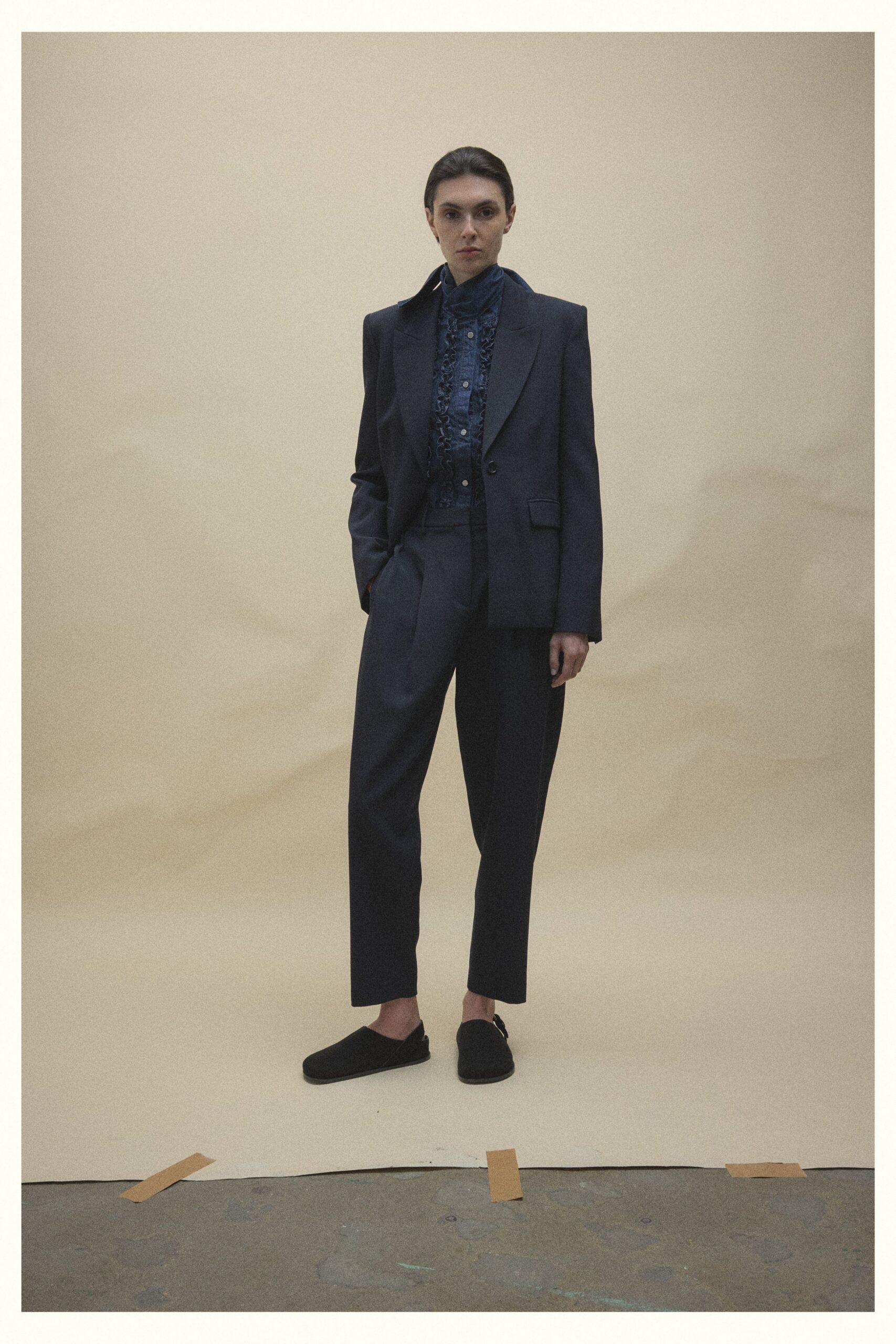 black tailored blazer with blue shirt