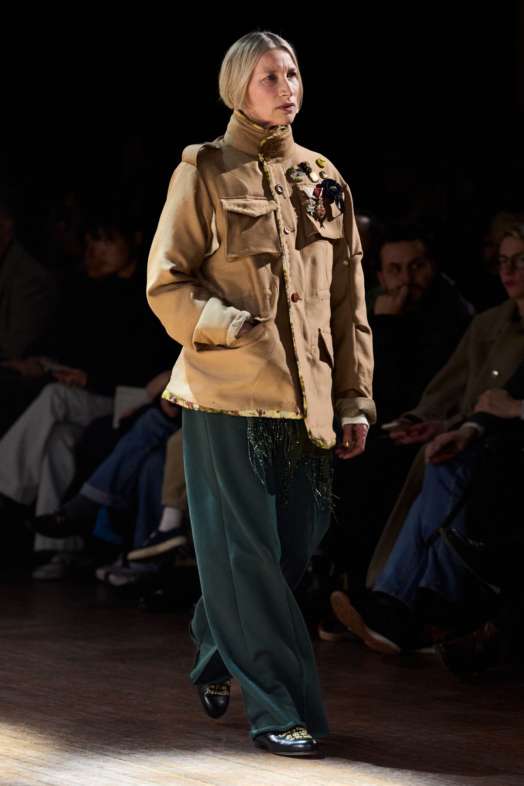 beige relaxed jacket with green pants