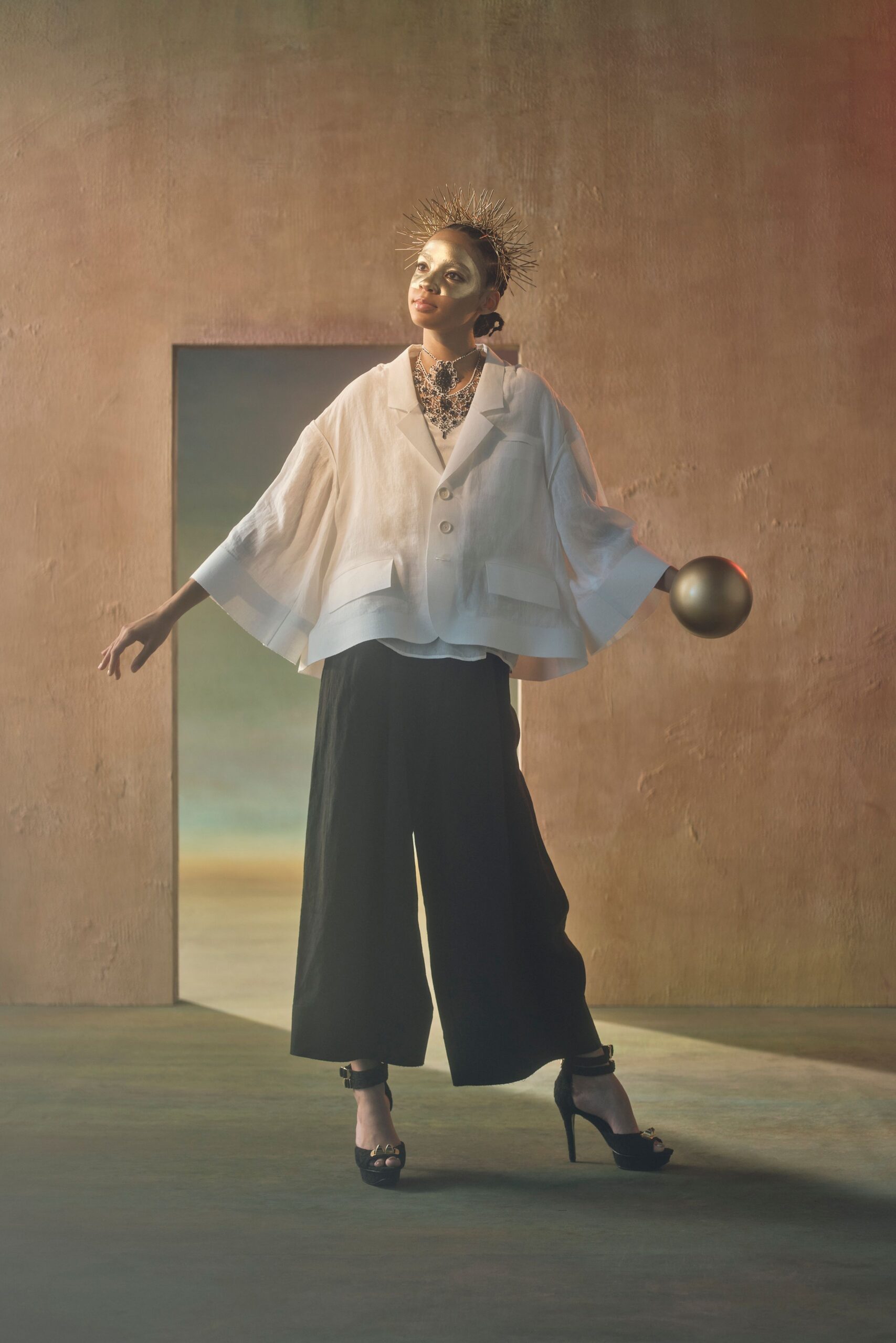 white relaxed top black wide-leg pants
