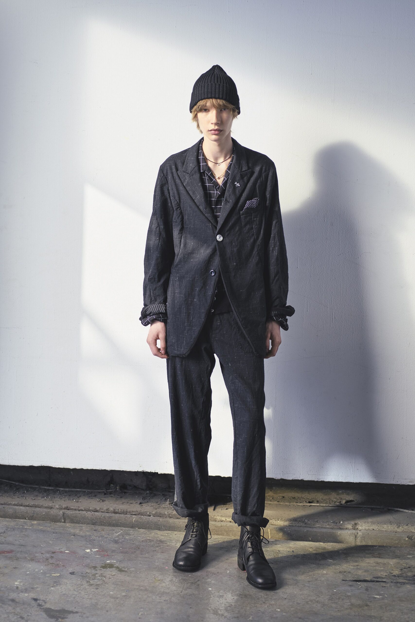 black tailored suit with hat