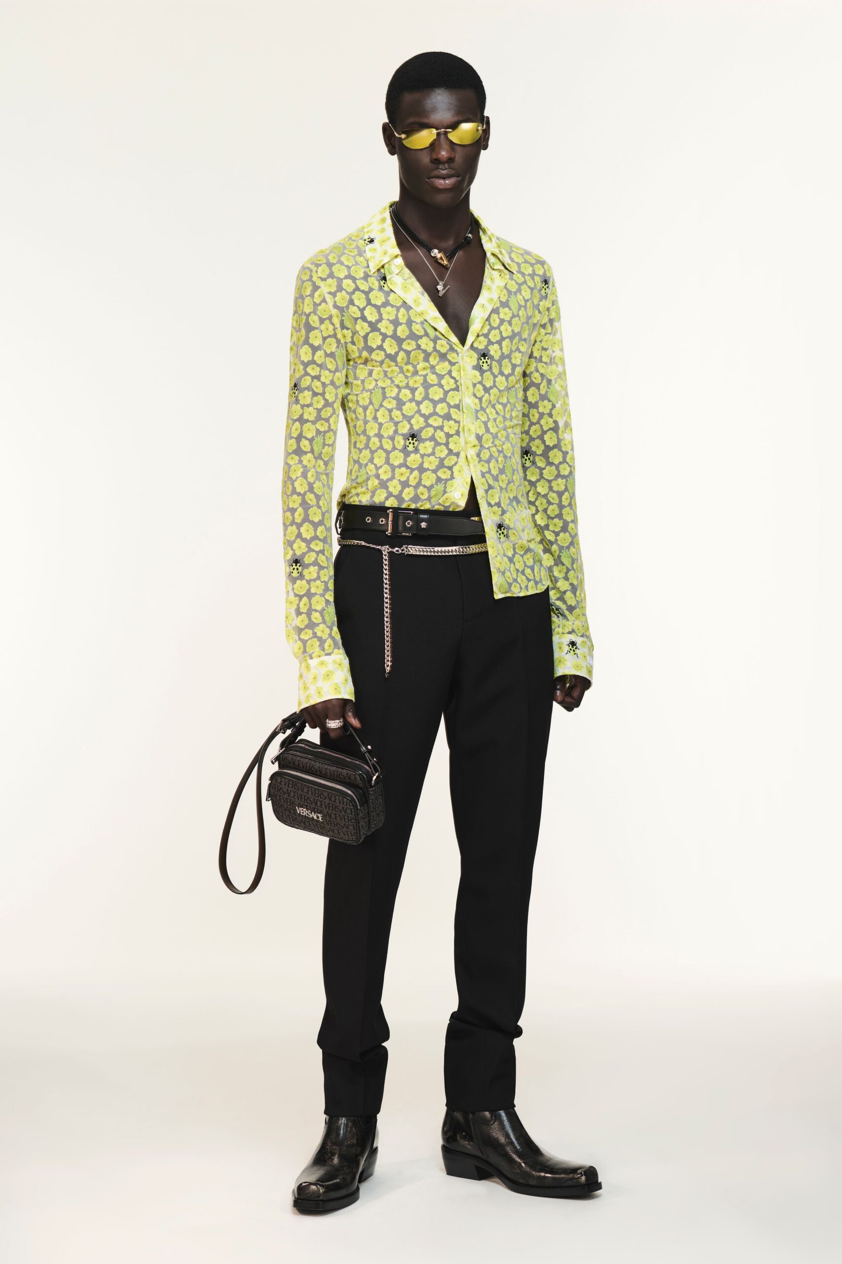 yellow printed shirt with black pants