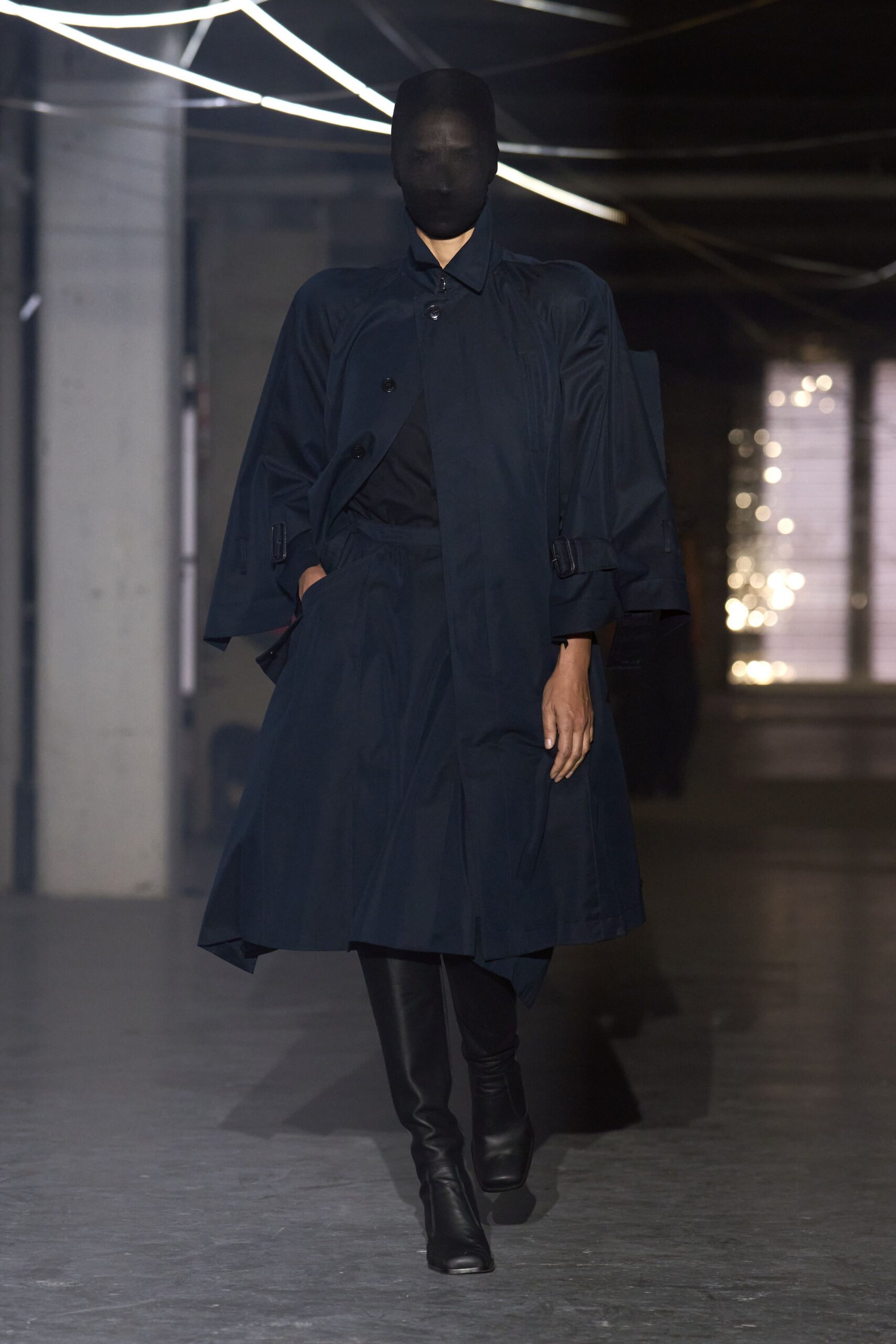 black relaxed coat with fitted pants