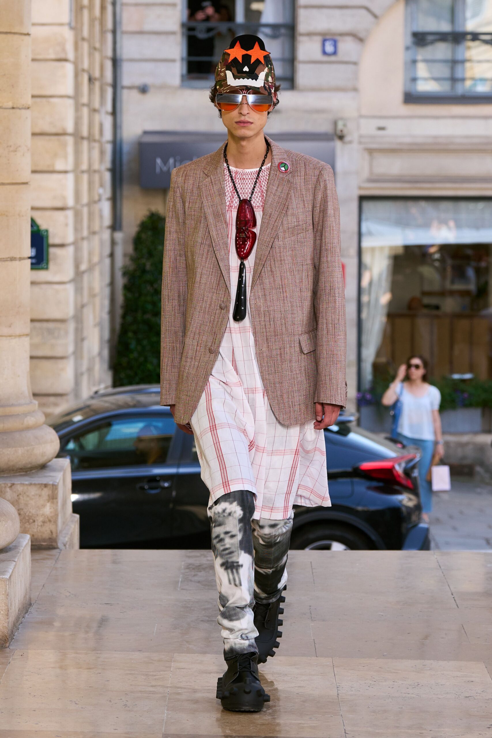 brown checked blazer with distressed pants
