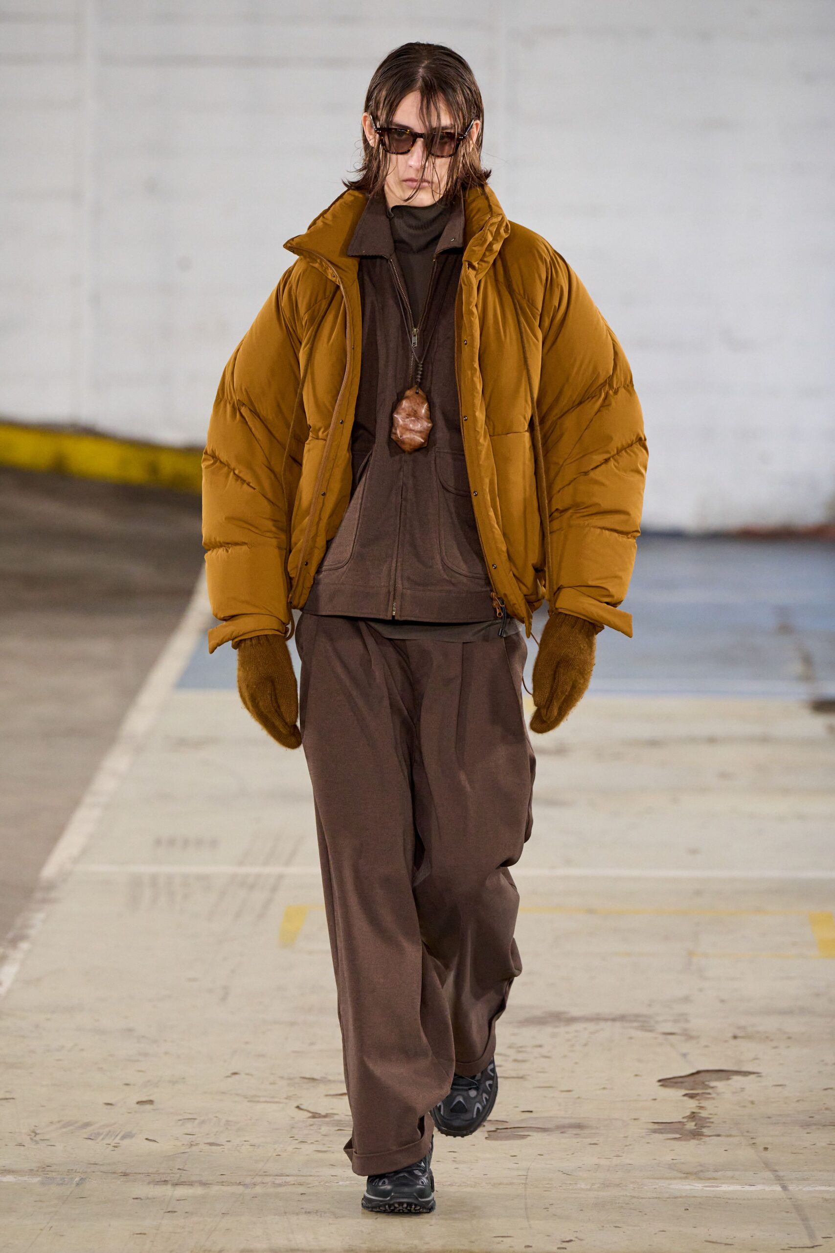 brown padded jacket with gloves
