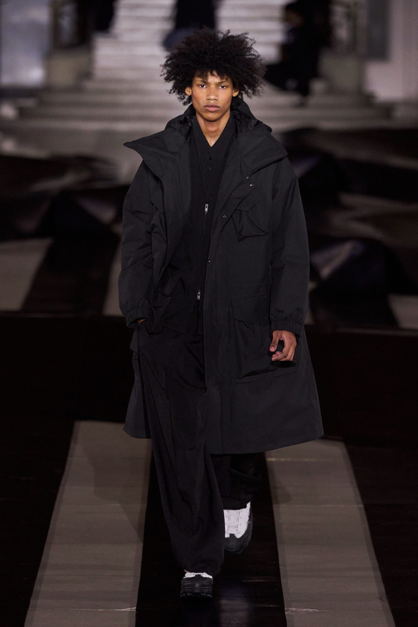 black cotton long-sleeve collared relaxed zippered coat