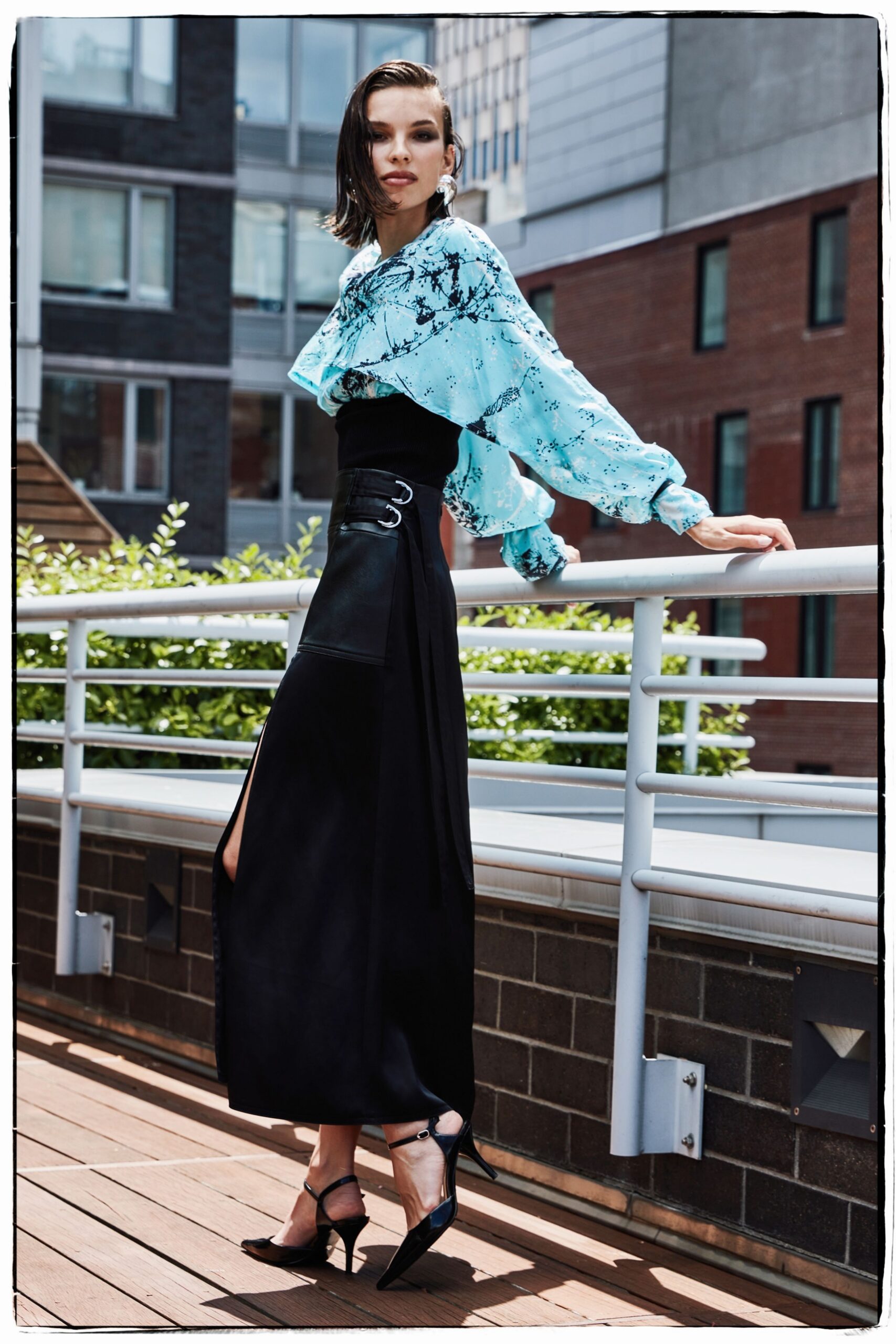 blue silk long-sleeve collared fitted ruffled top