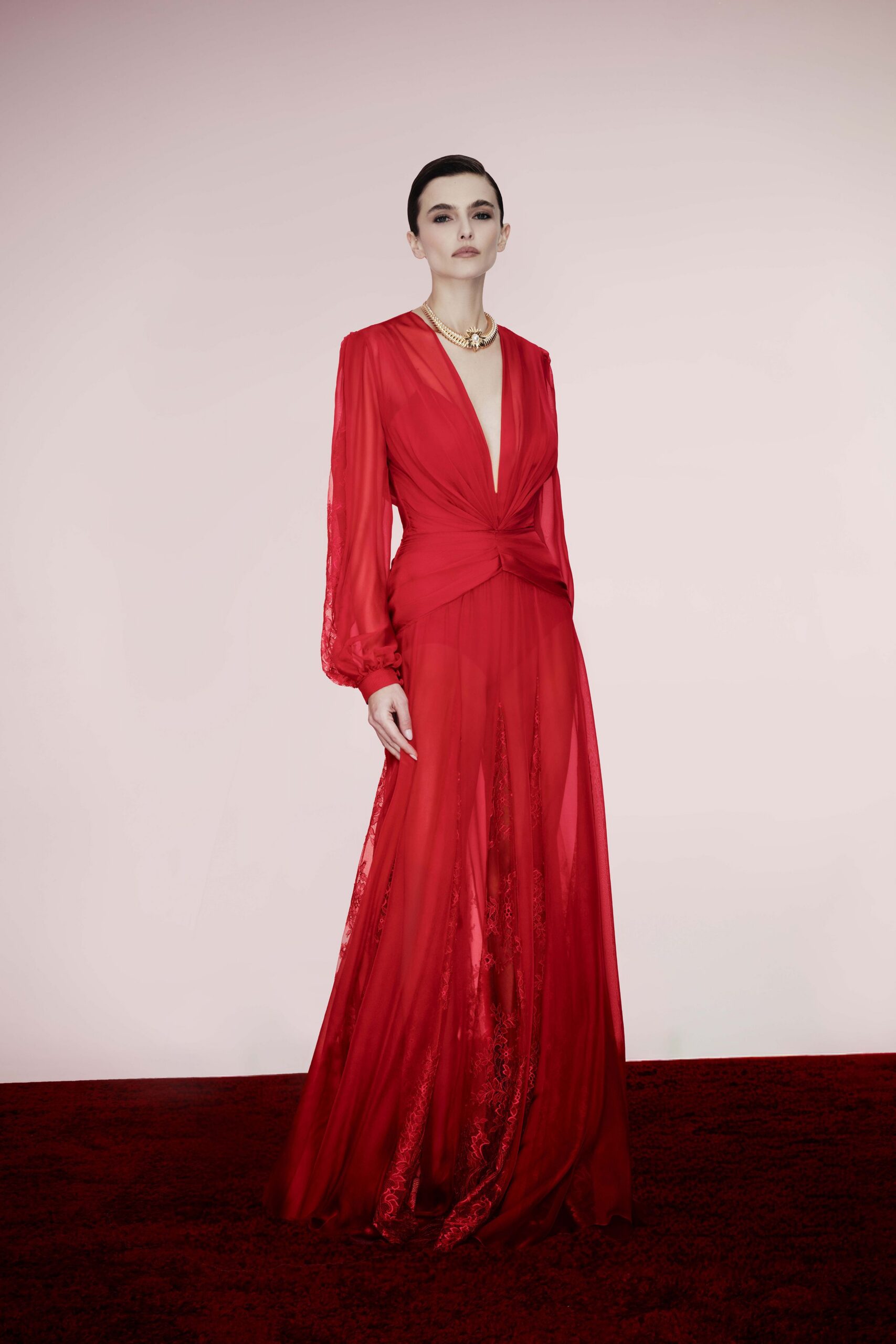 red silk long-sleeve gown