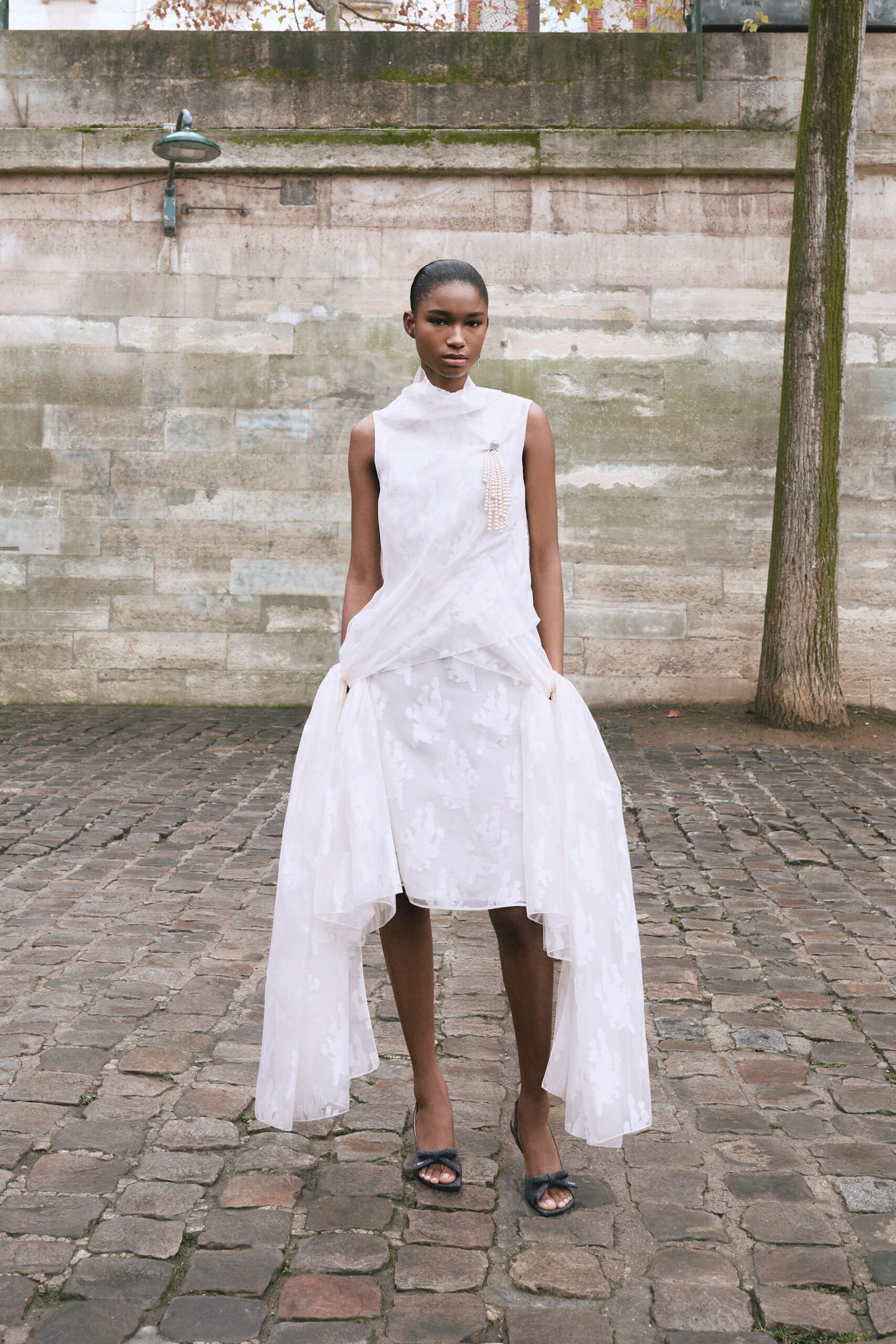 white silk sleeveless collared fitted pleated layered dress