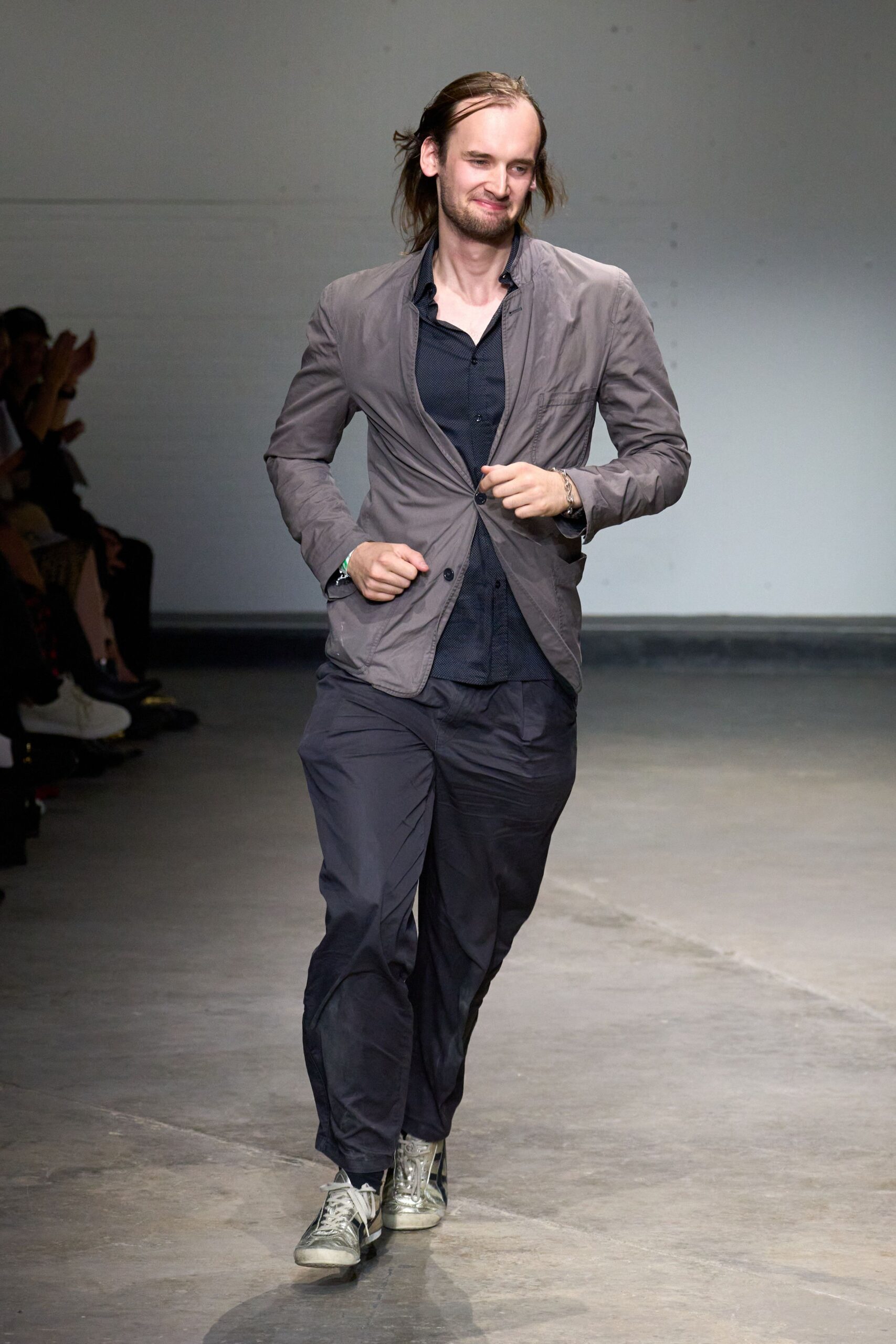 gray blazer black shirt relaxed pants