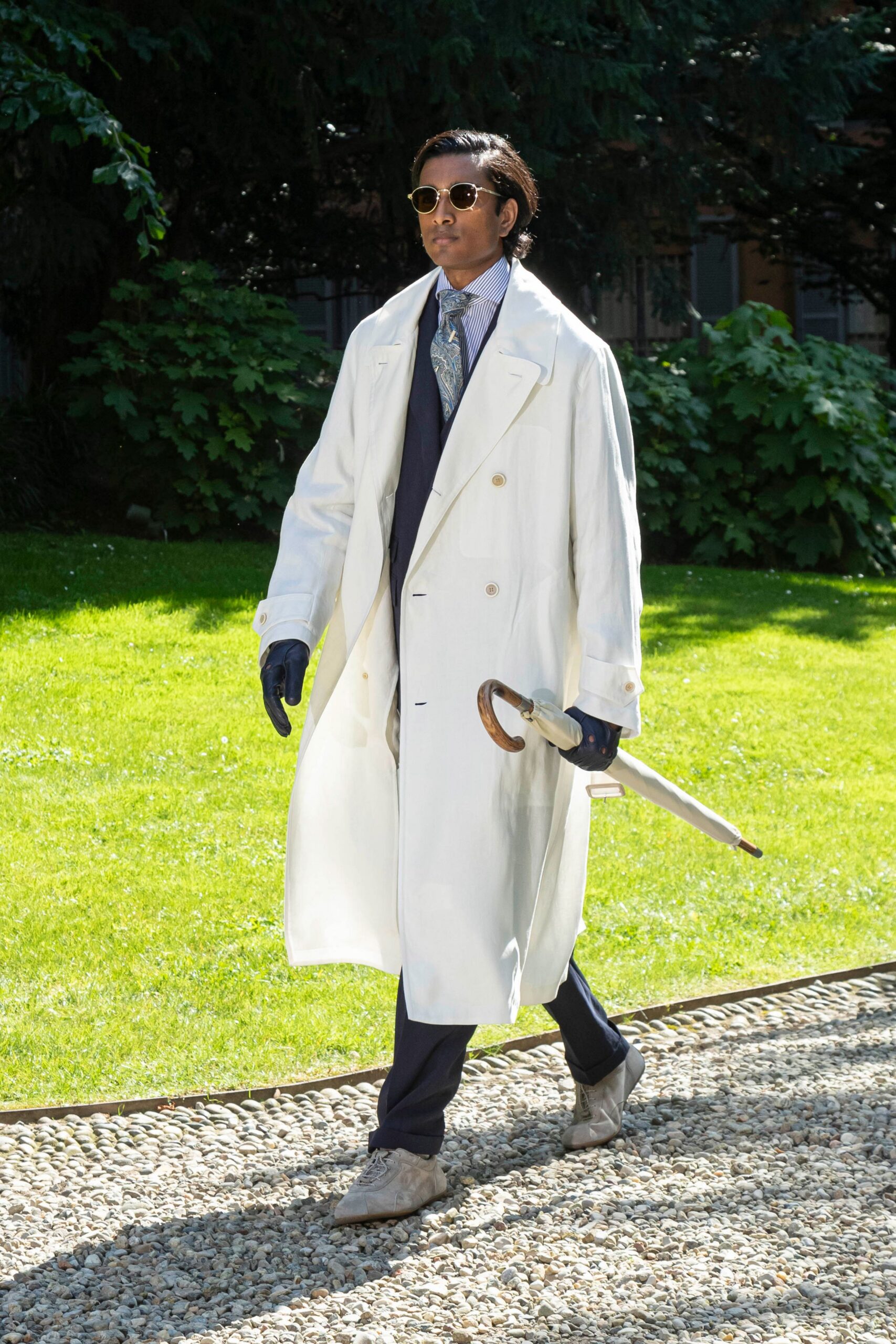 white oversized coat with navy suit