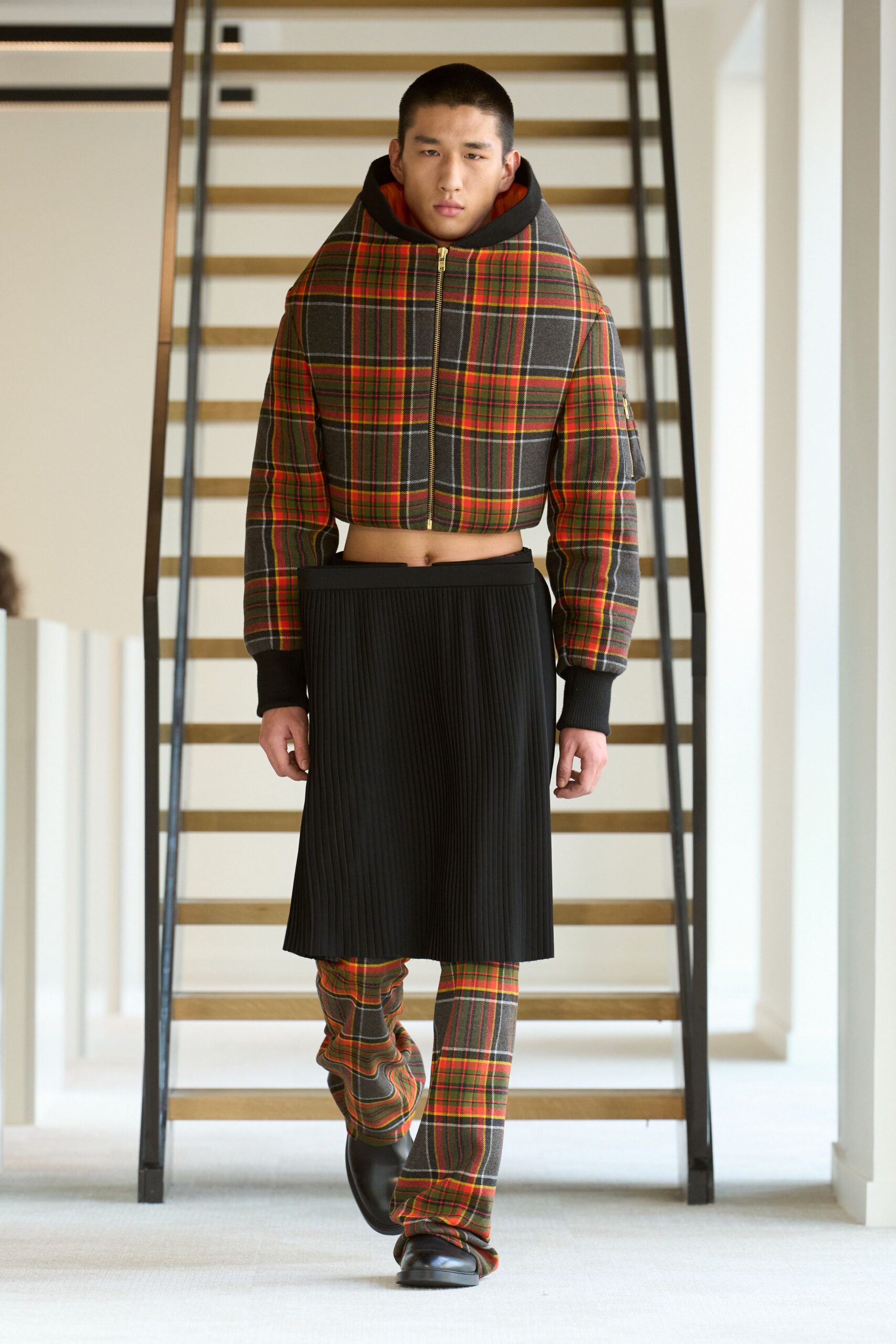 checked jacket with pleated skirt