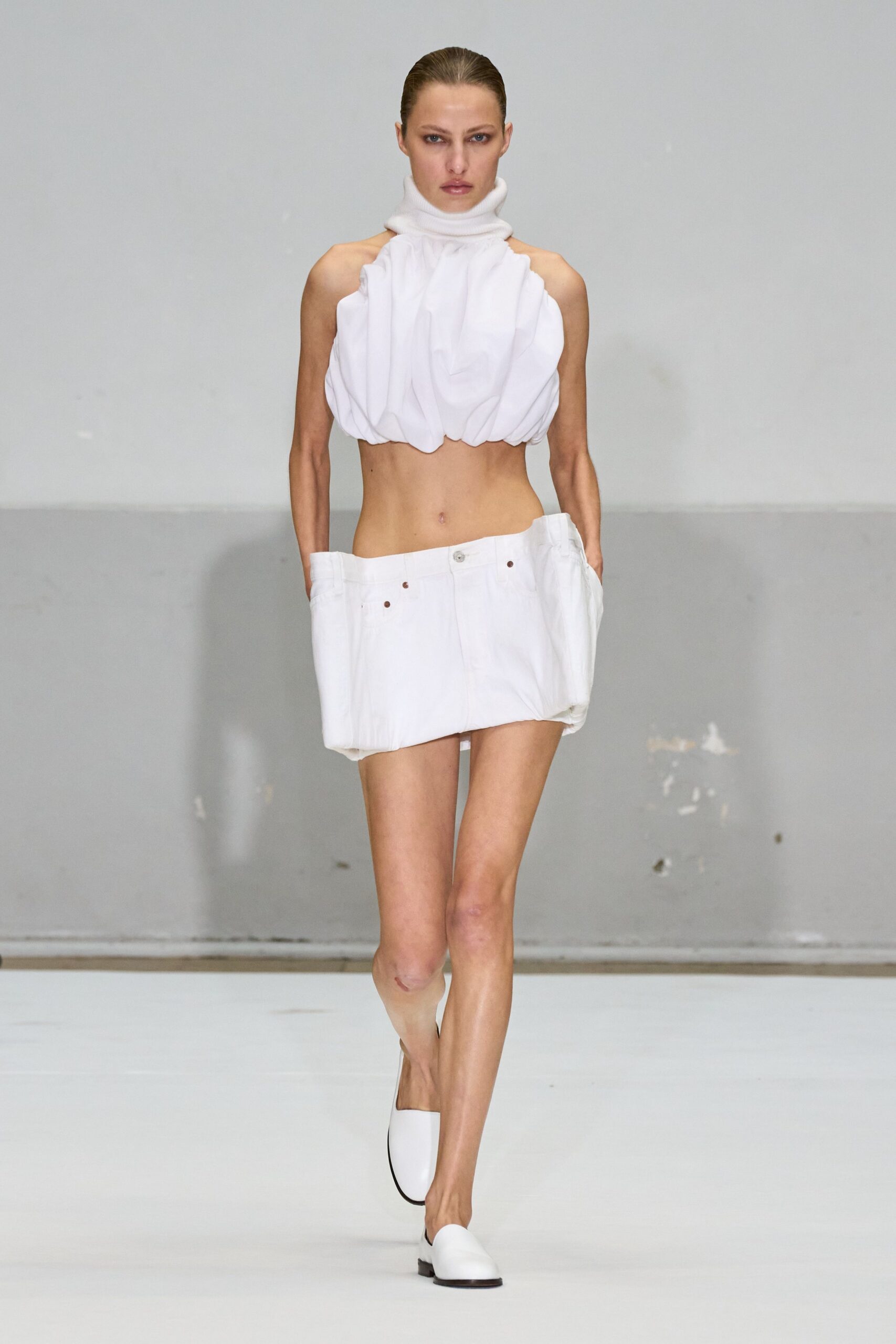 white fitted top and mini skirt