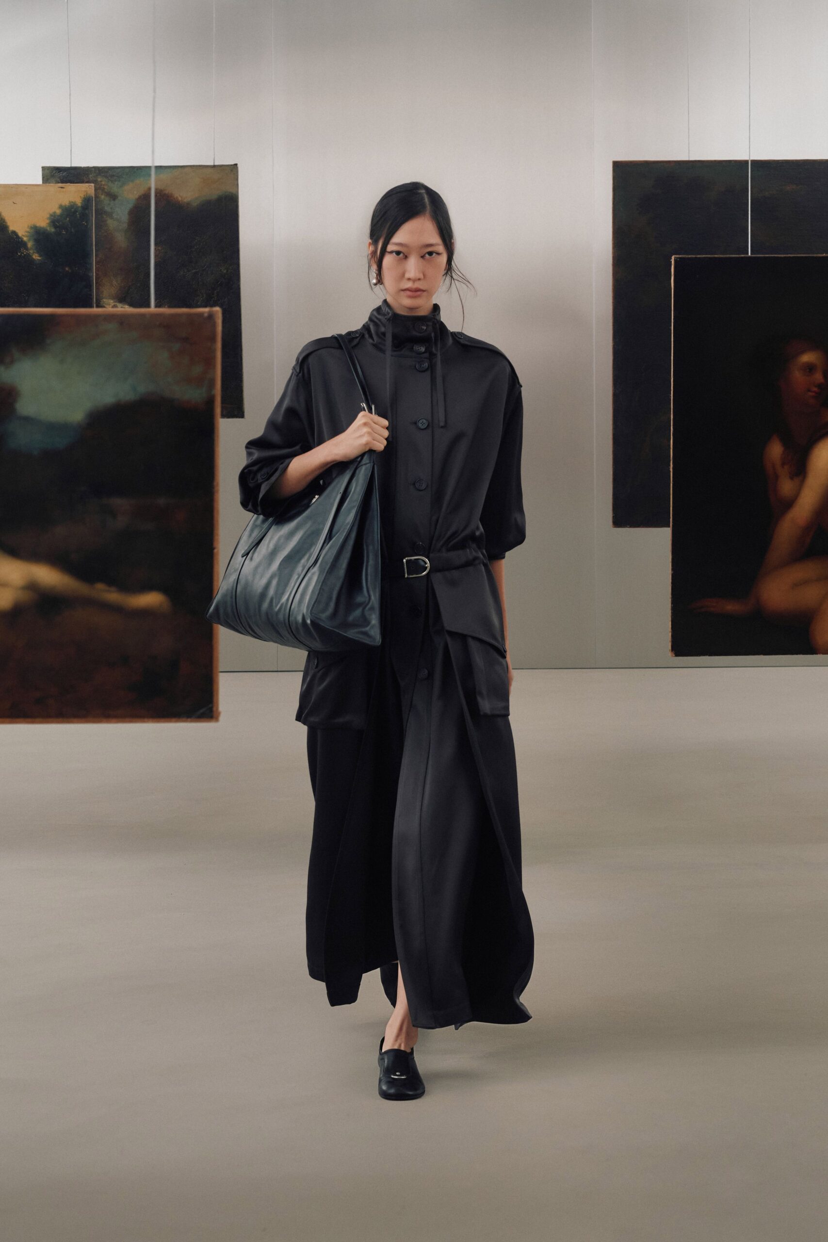 black leather long-sleeve collared fitted belted midi coat