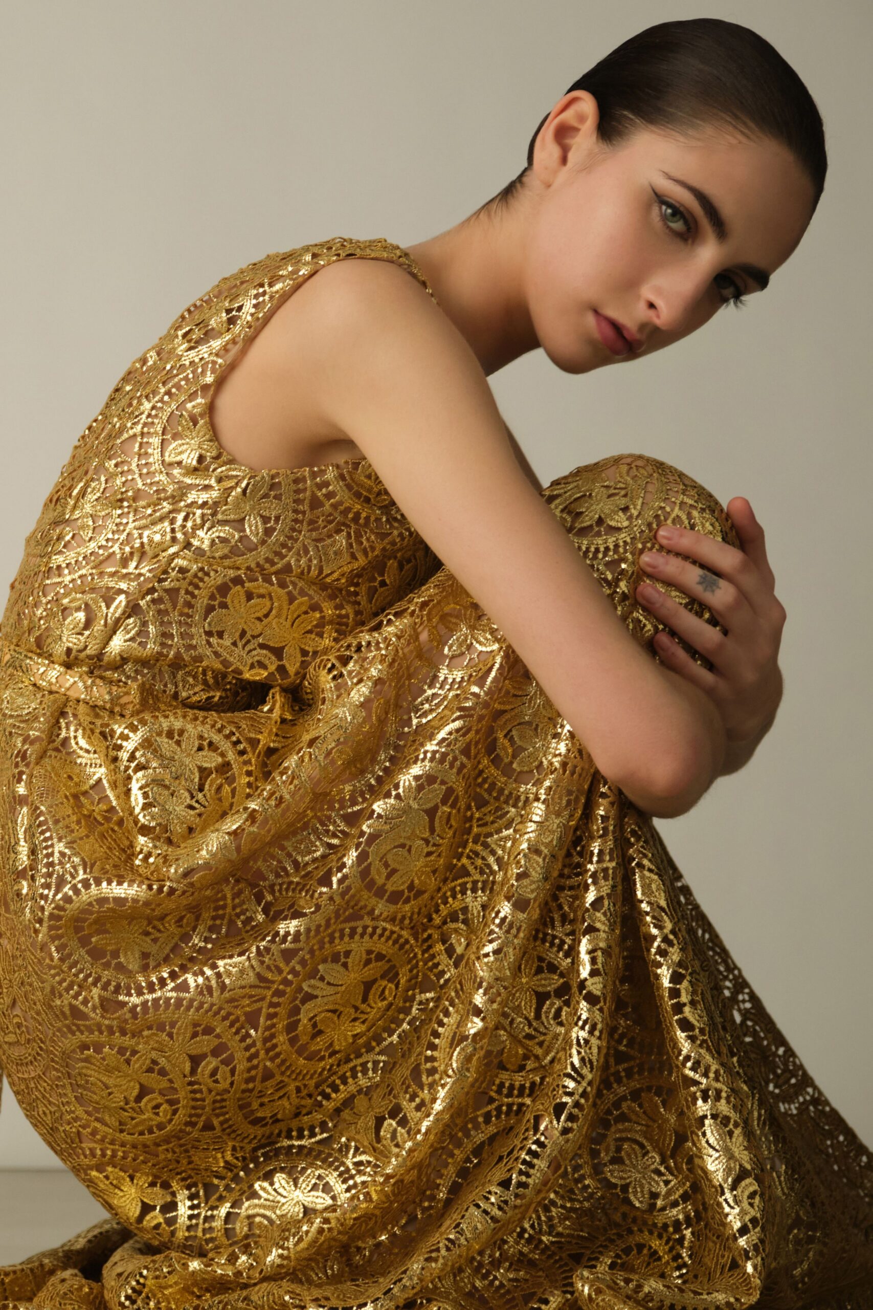 gold embroidered sleeveless gown