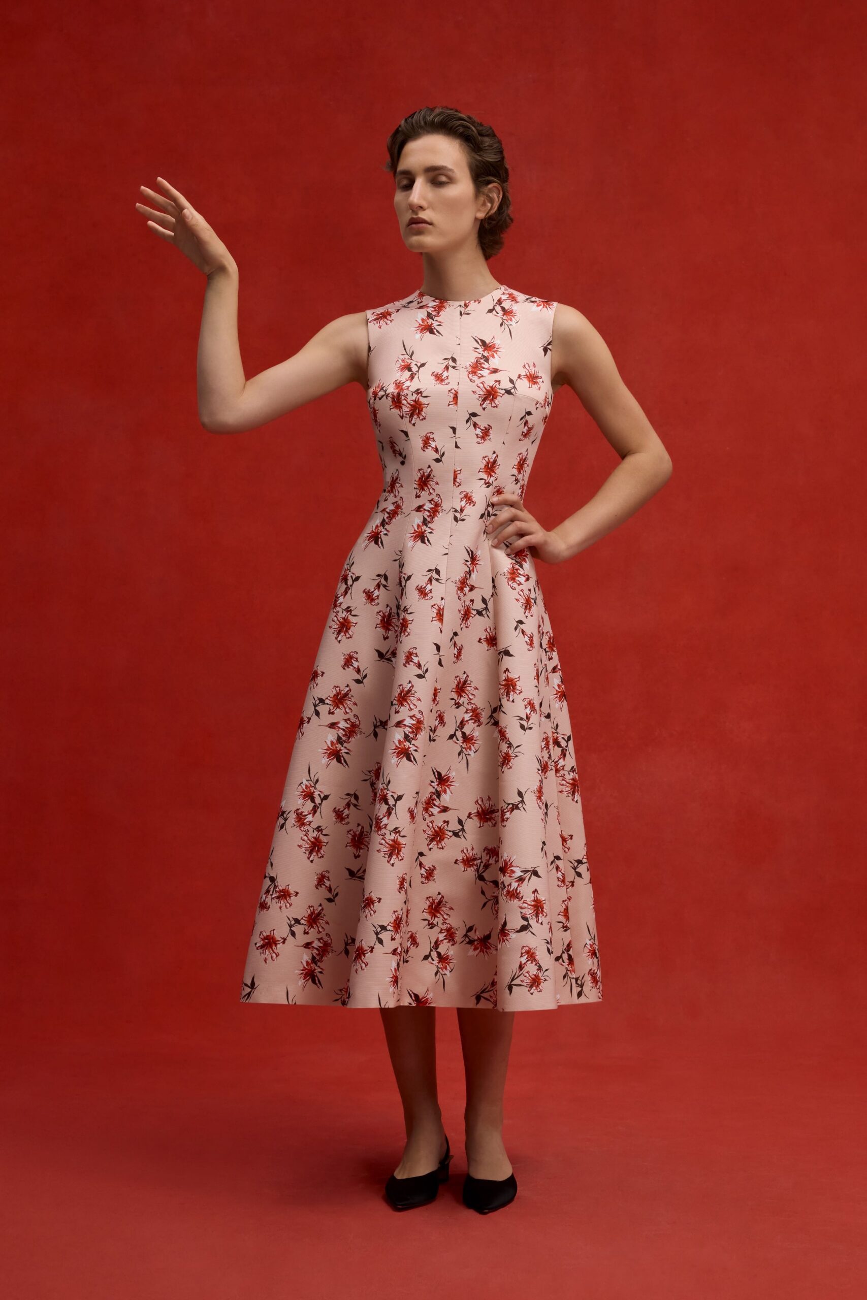 pink floral midi dress with black shoes