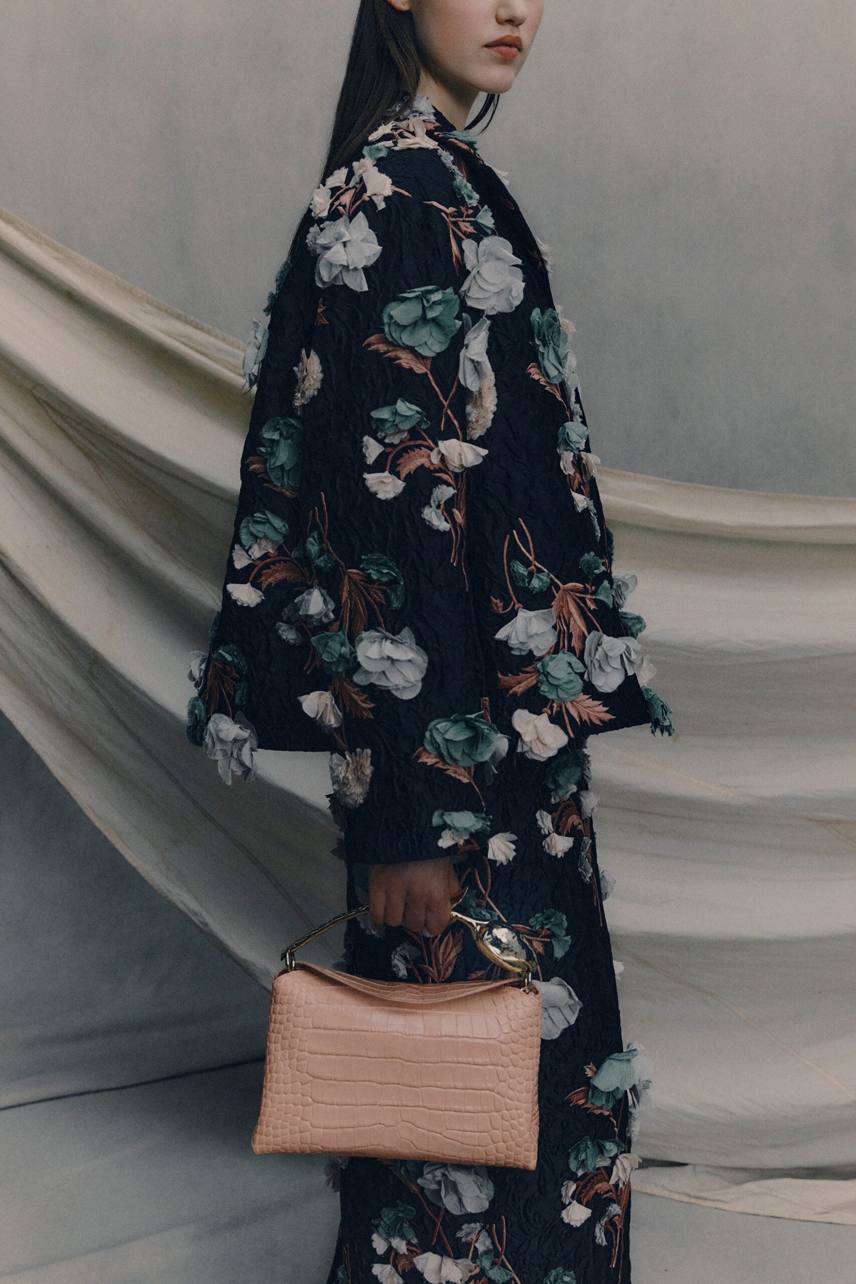 black embroidered jacket and skirt