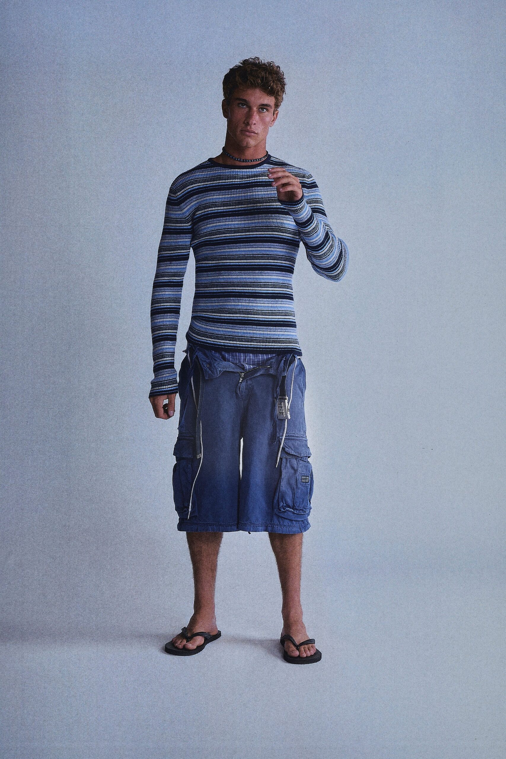 blue striped top with cargo shorts