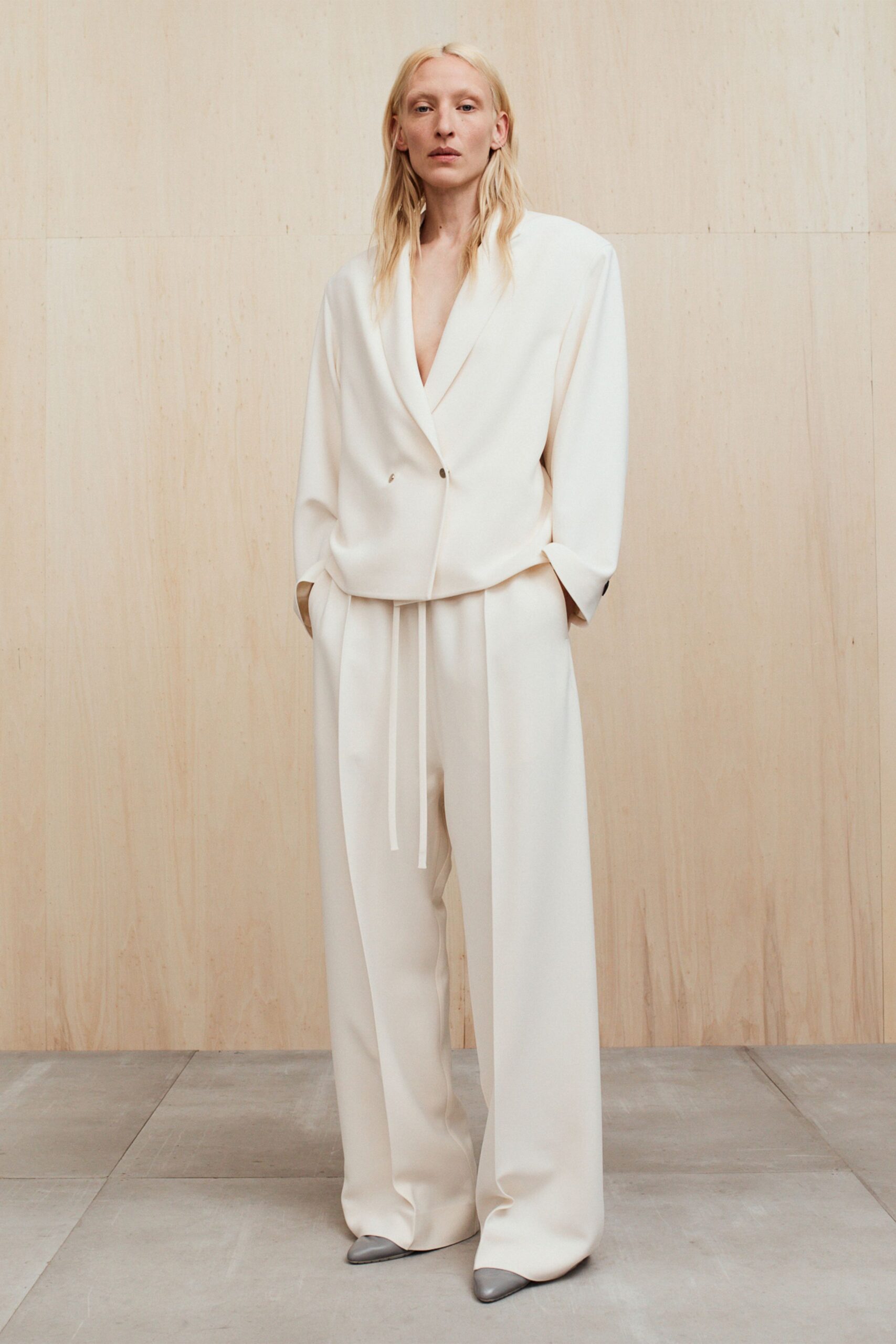 white silk long-sleeve v-neck relaxed buttoned blazer