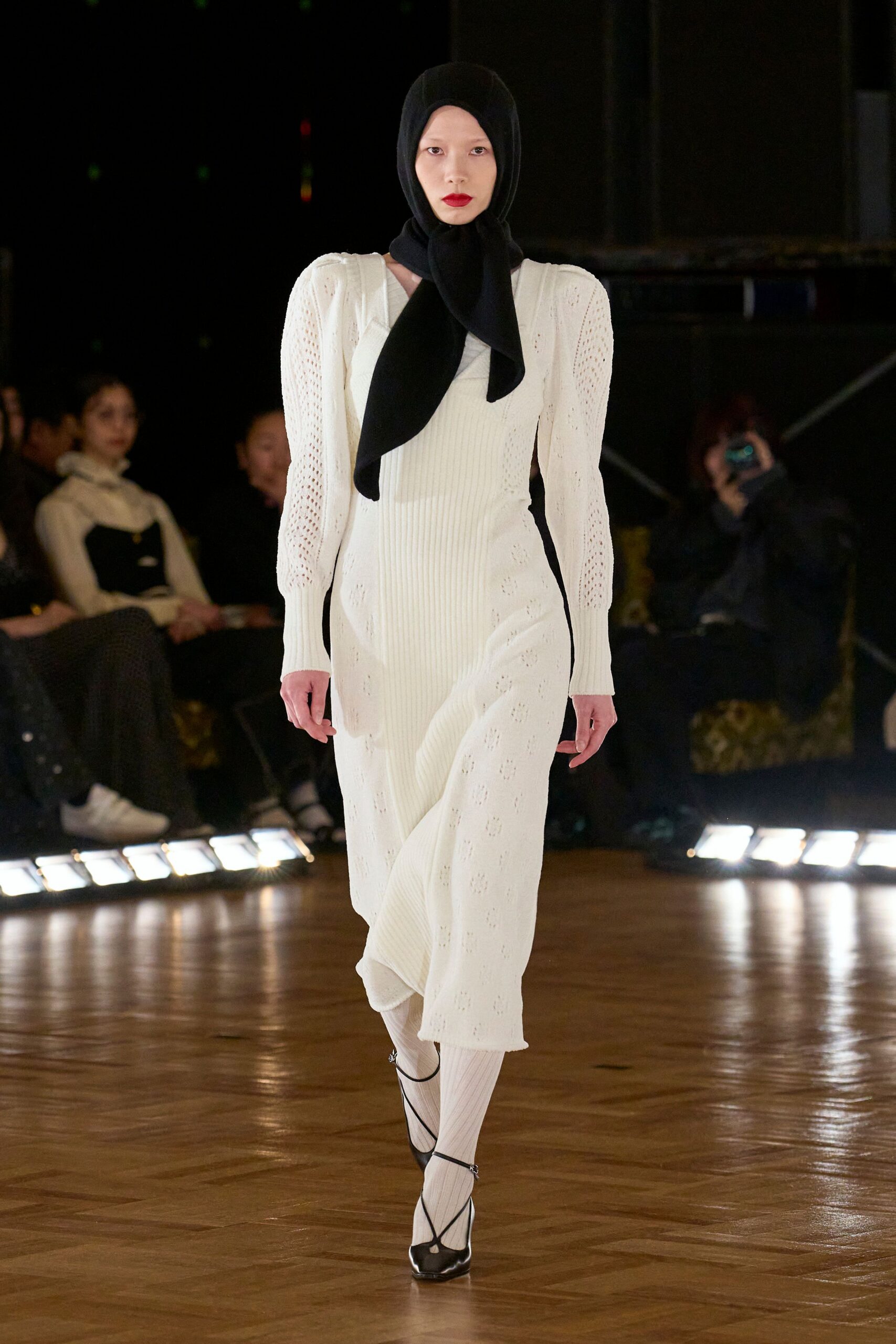 white fitted midi dress with black hat