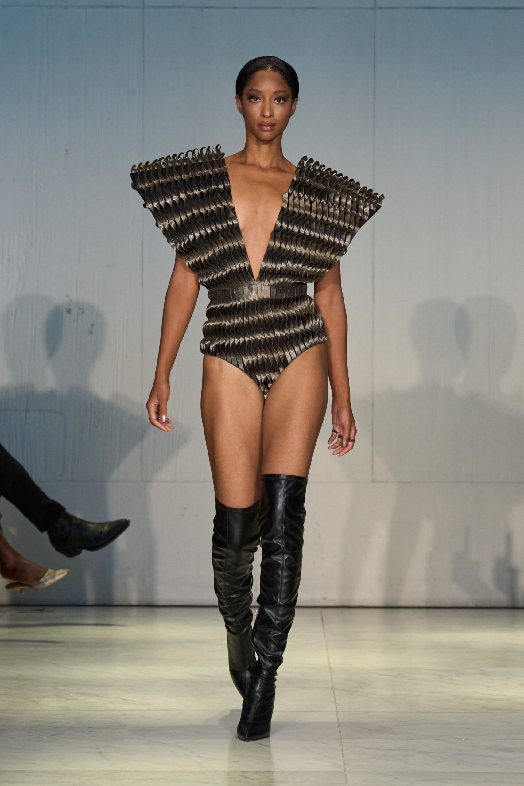 black gold pleated bodysuit with boots