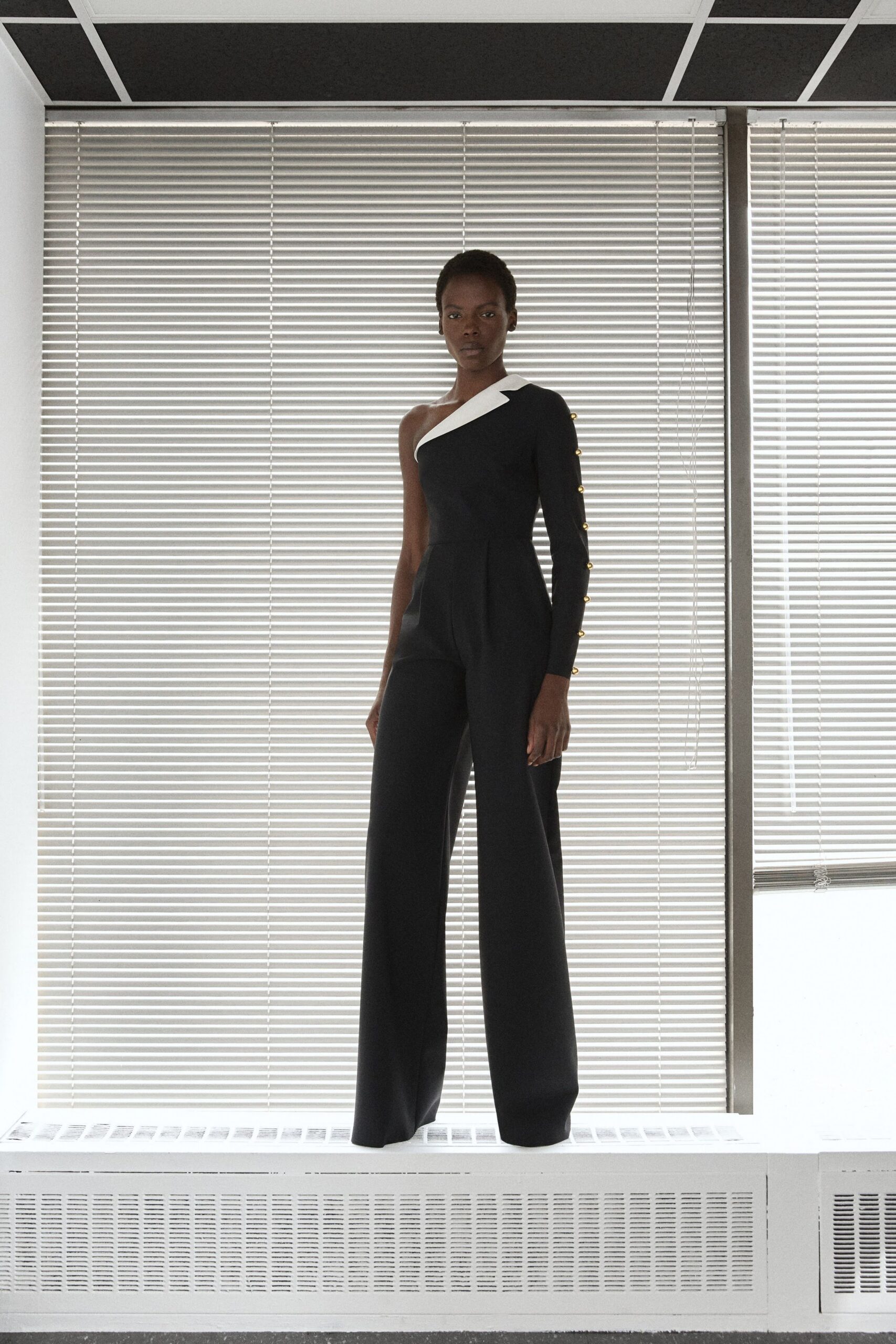 black fitted asymmetric jumpsuit
